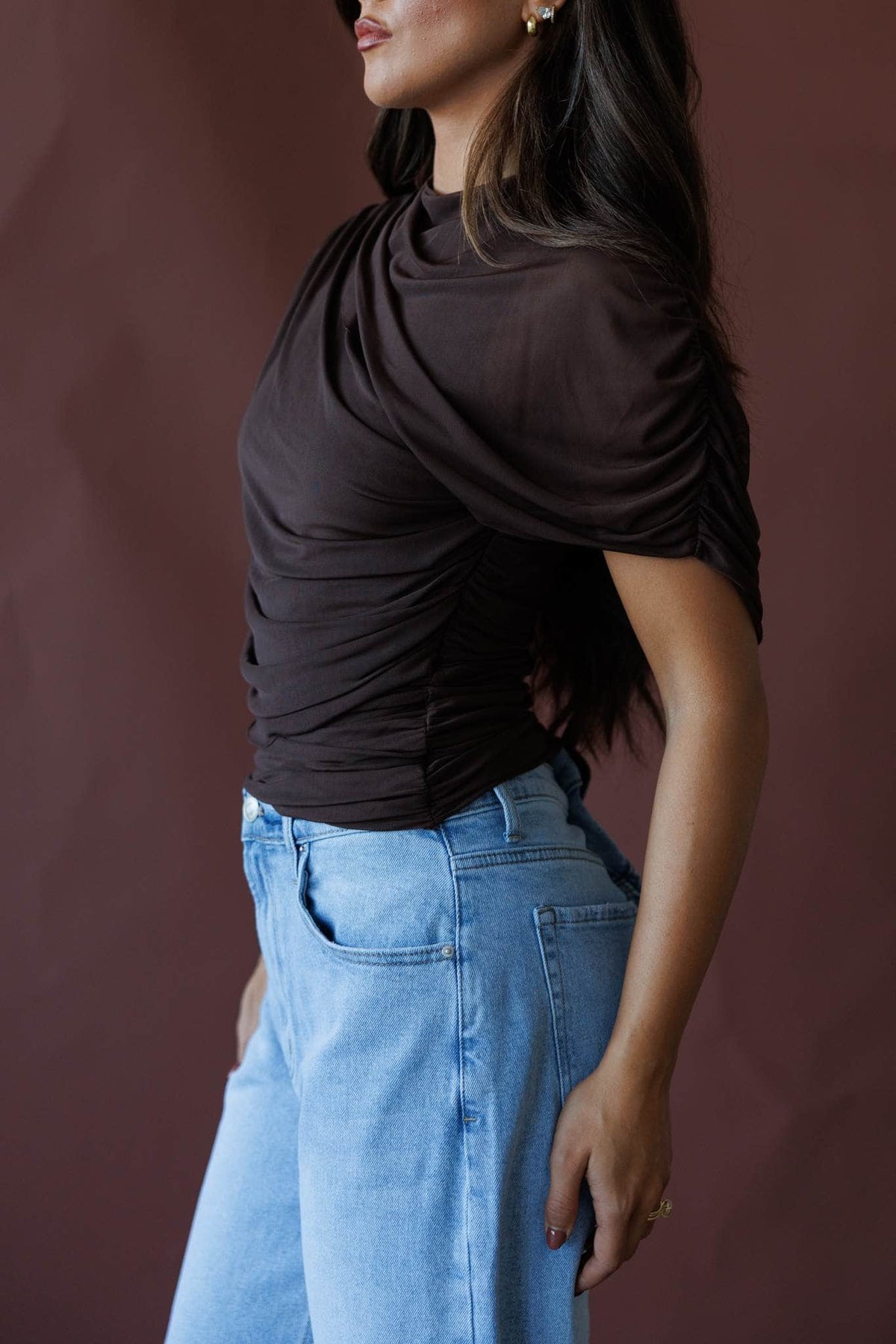 Brown draped asymmetric cape top