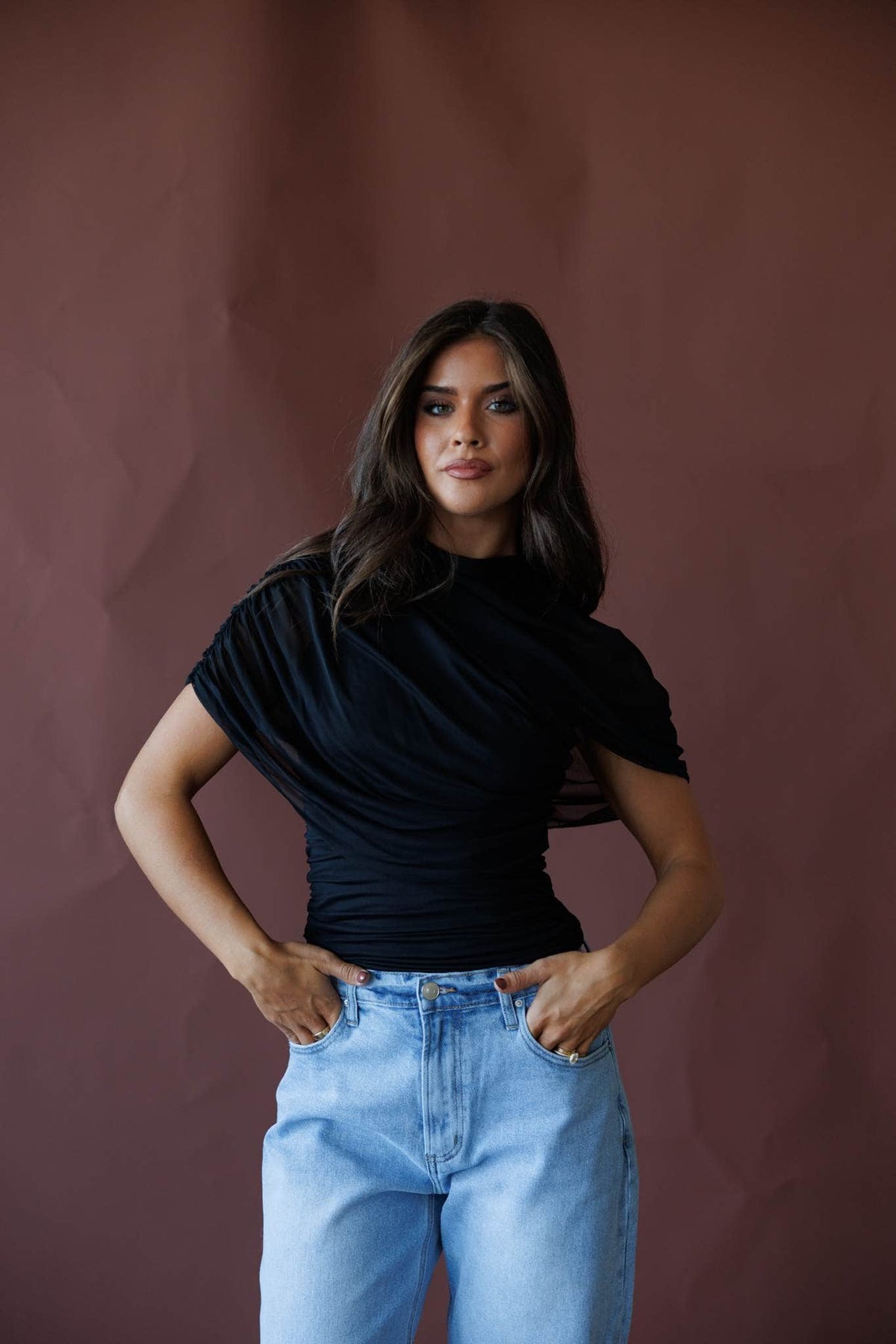 Brown draped asymmetric cape top
