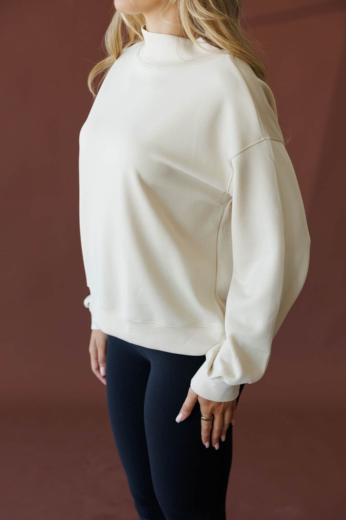 Cream mock neck sweatshirt
