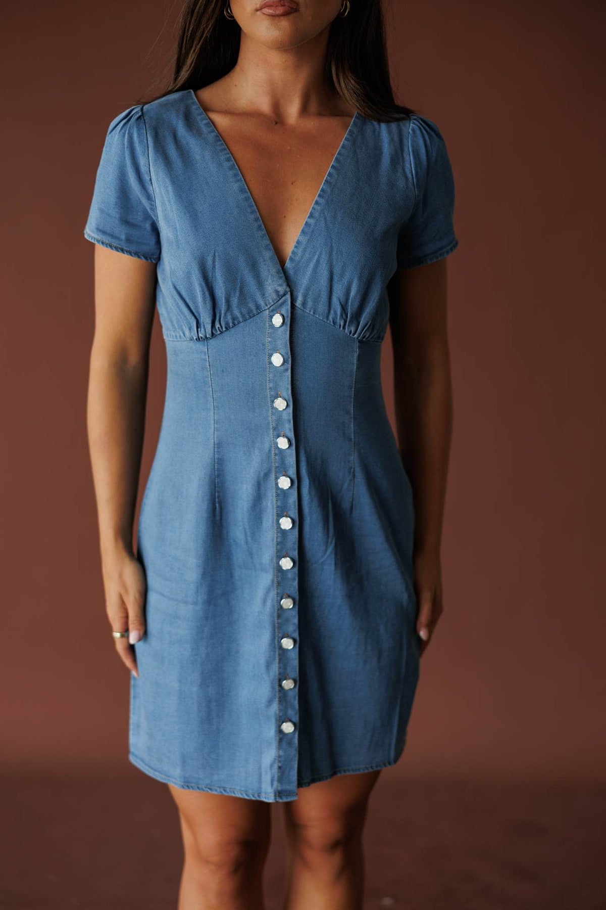Medium wash denim button front mini dress