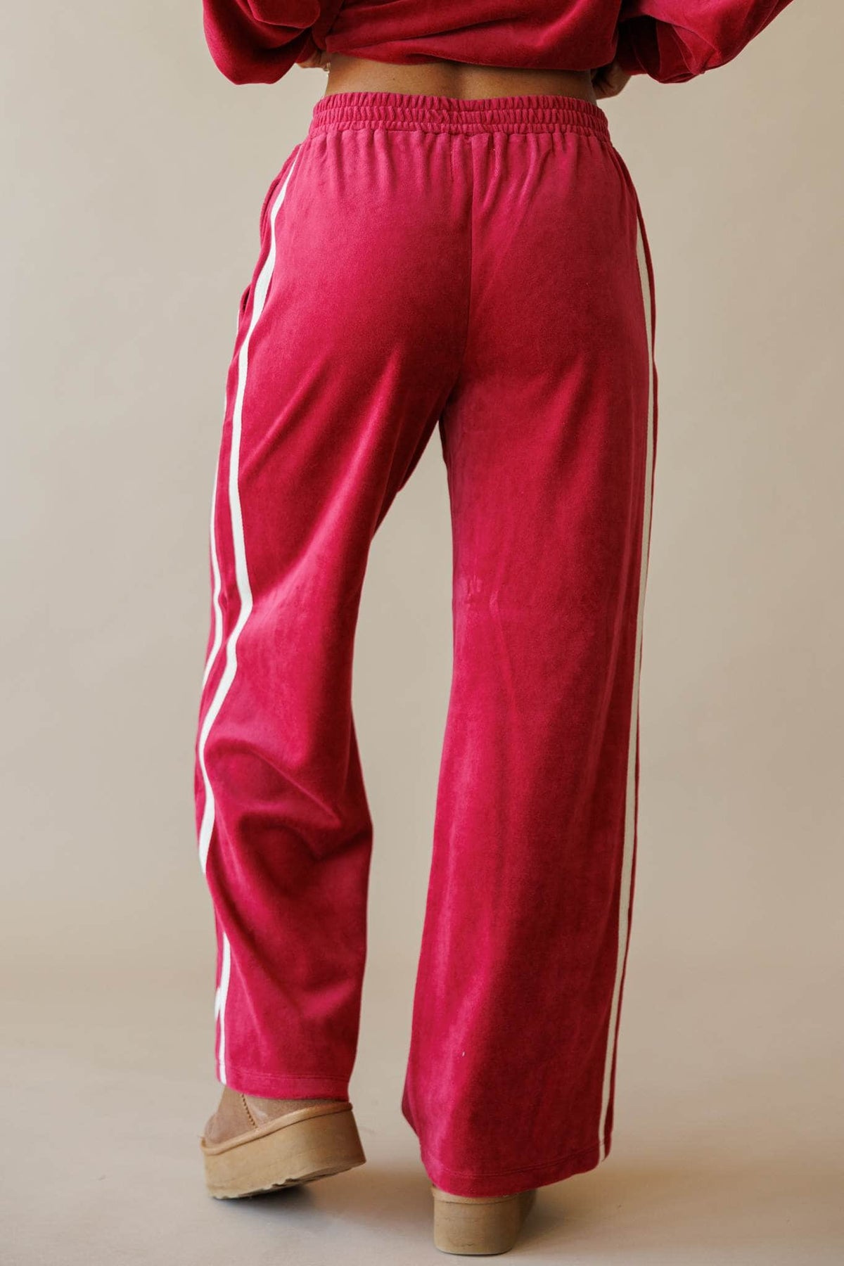 Berry velour track pants with side stripe