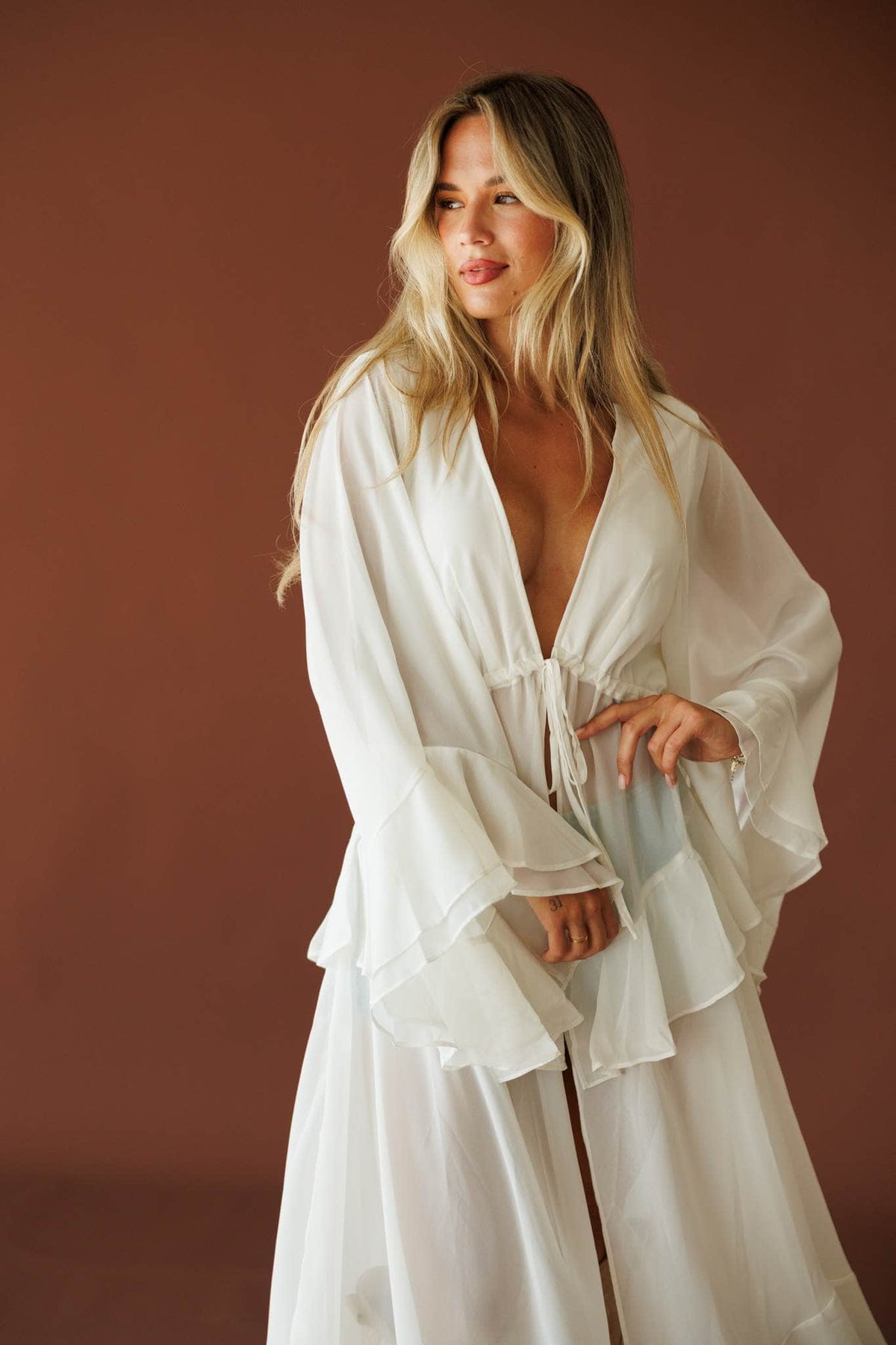 Desert Angel Duster in cream, front view on model with the duster open
