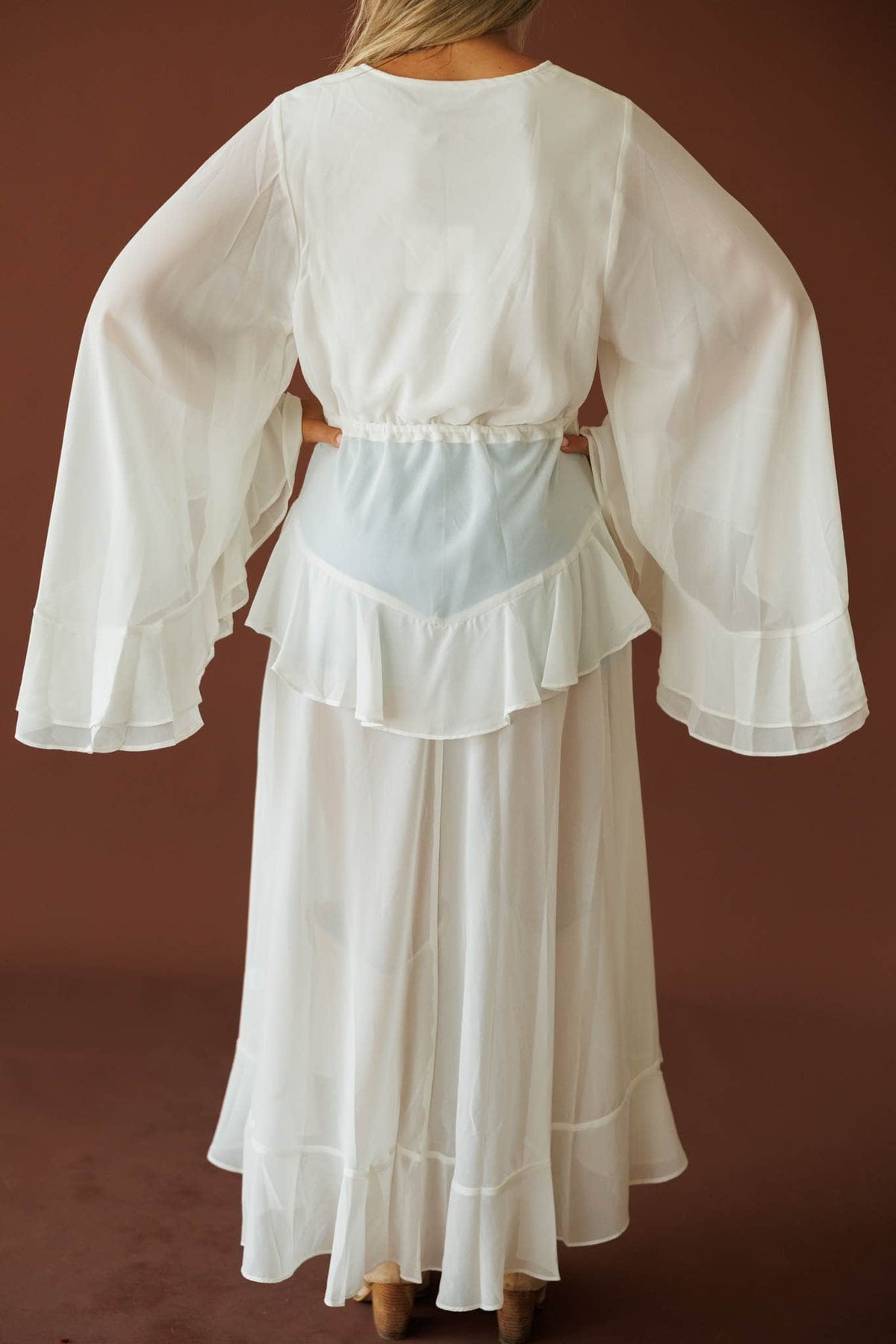 Desert Angel Duster in cream, back view showing the sheer ruffled back