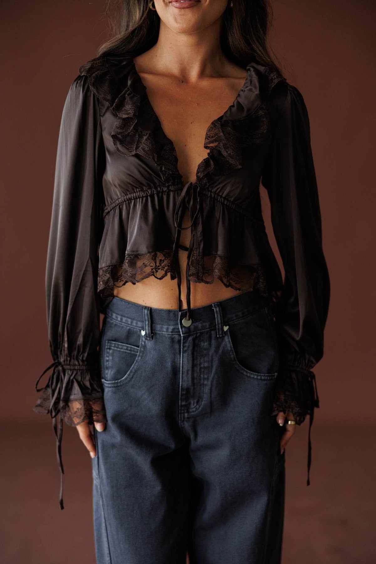 Ruffled Up Chiffon Blouse in brown, front close-up of the ruffle placket and sheer chiffon