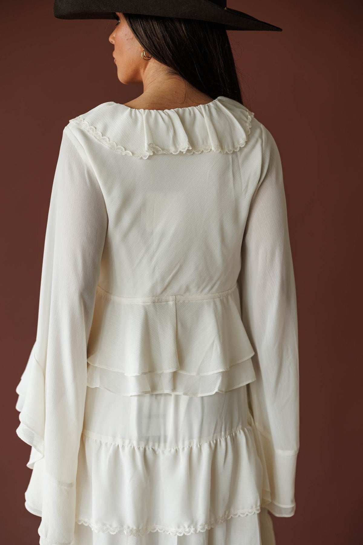 Cream ruffle V neck blouse