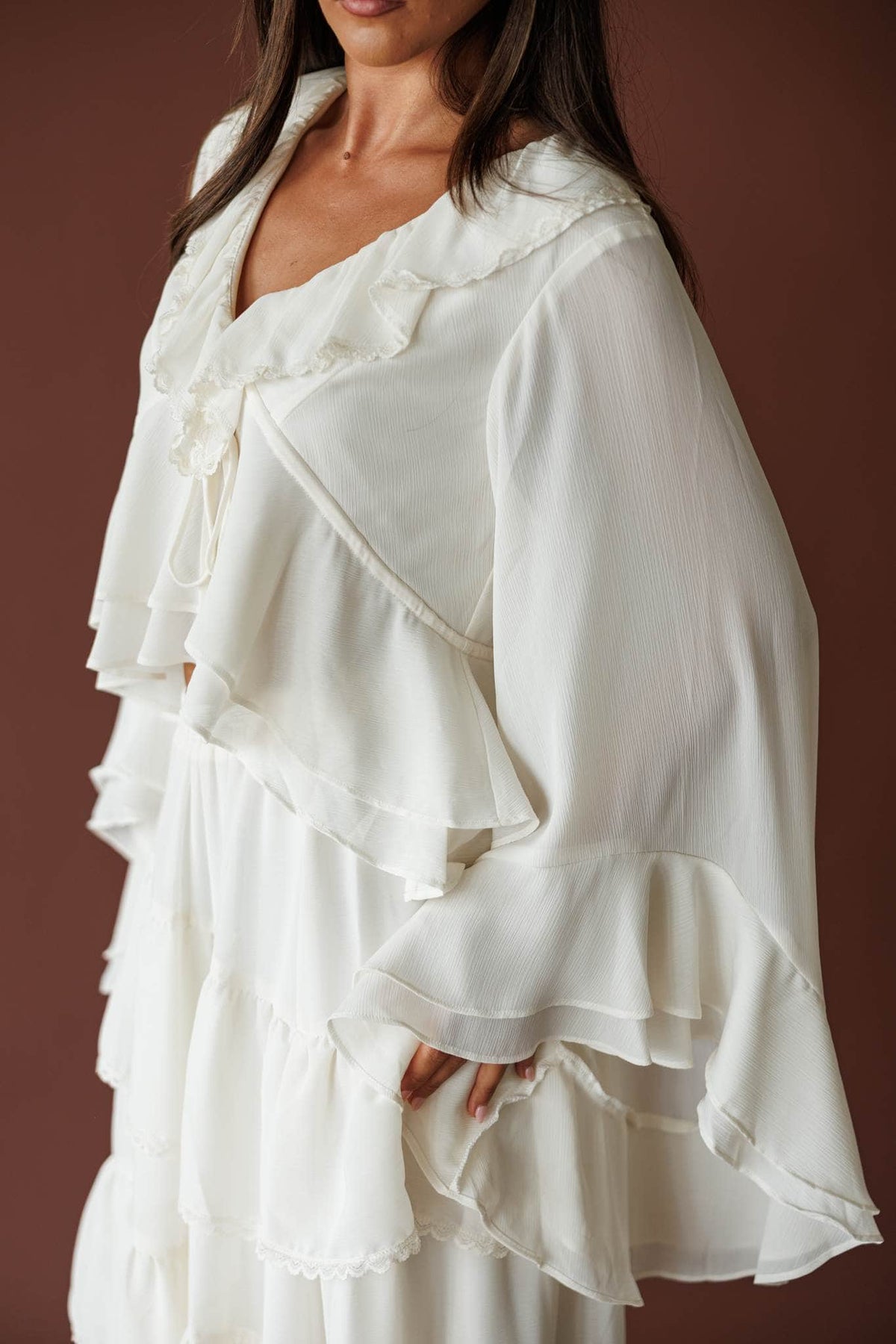 Cream ruffle V neck blouse