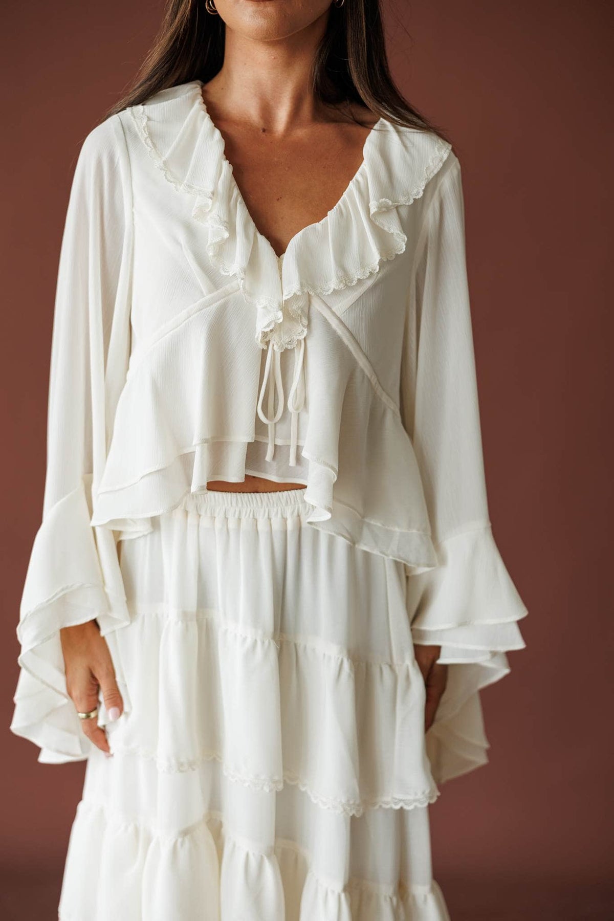 Cream ruffle V neck blouse