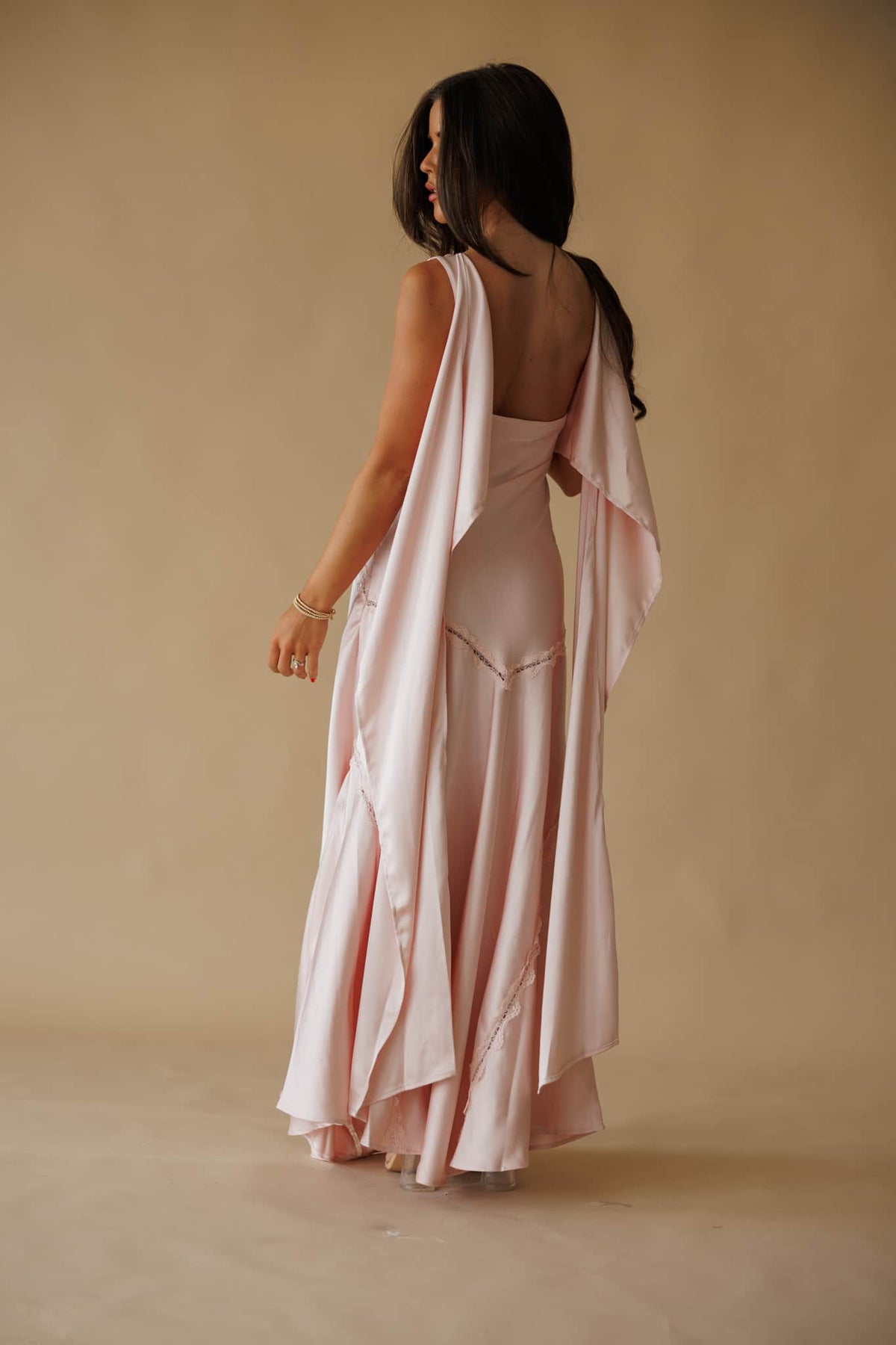 Chasing Forever Dress in dusty pink, back view showing the open back and sash