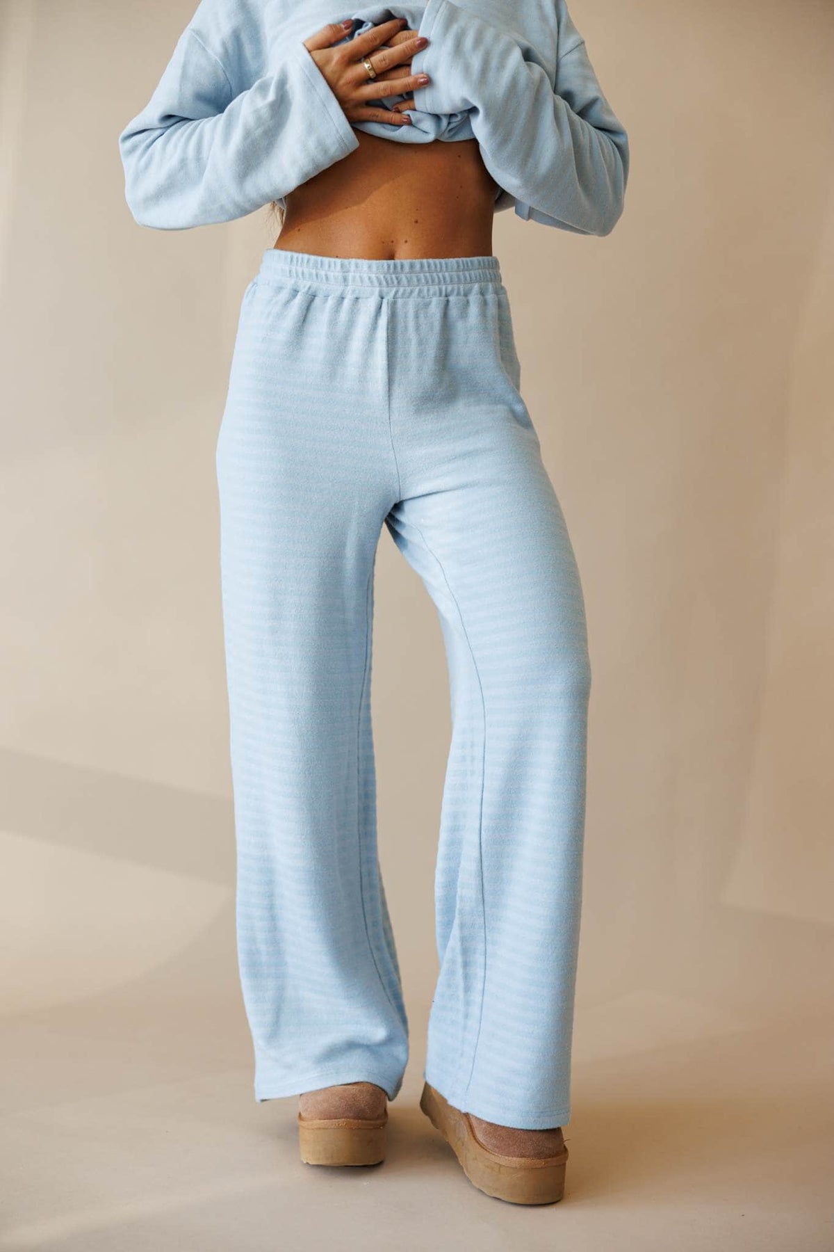 Pale blue ribbed knit wide leg pants, front view