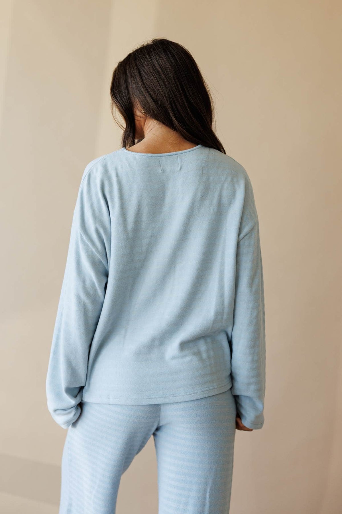 Pale blue ribbed knit long sleeve top