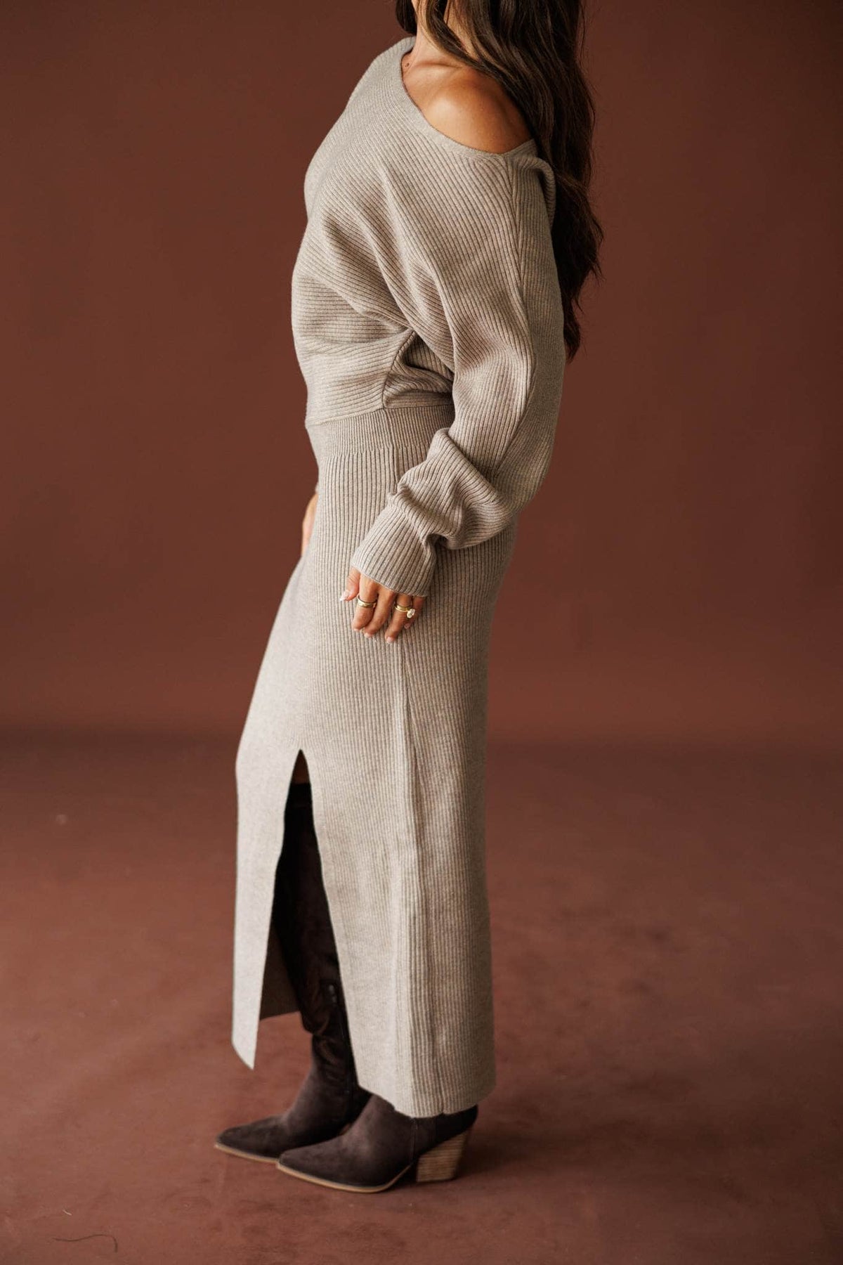 Fireside Mode Sweater Dress in oatmeal, side view showing the front slit and knit maxi