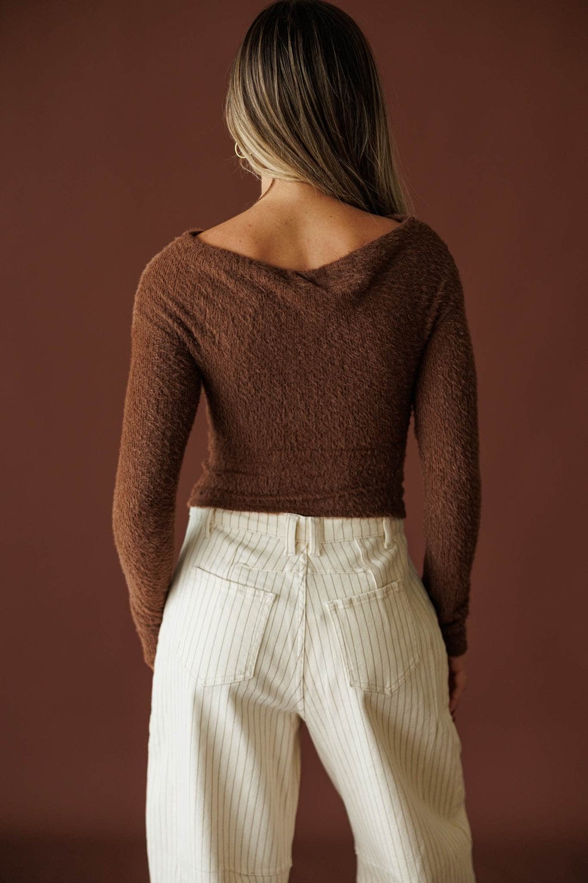 Feels Like Fall Sweater in chocolate, back view of the cropped fitted knit