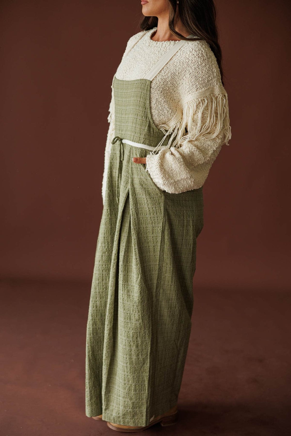 Field Trip Overalls in olive, side view of the gauze wide leg