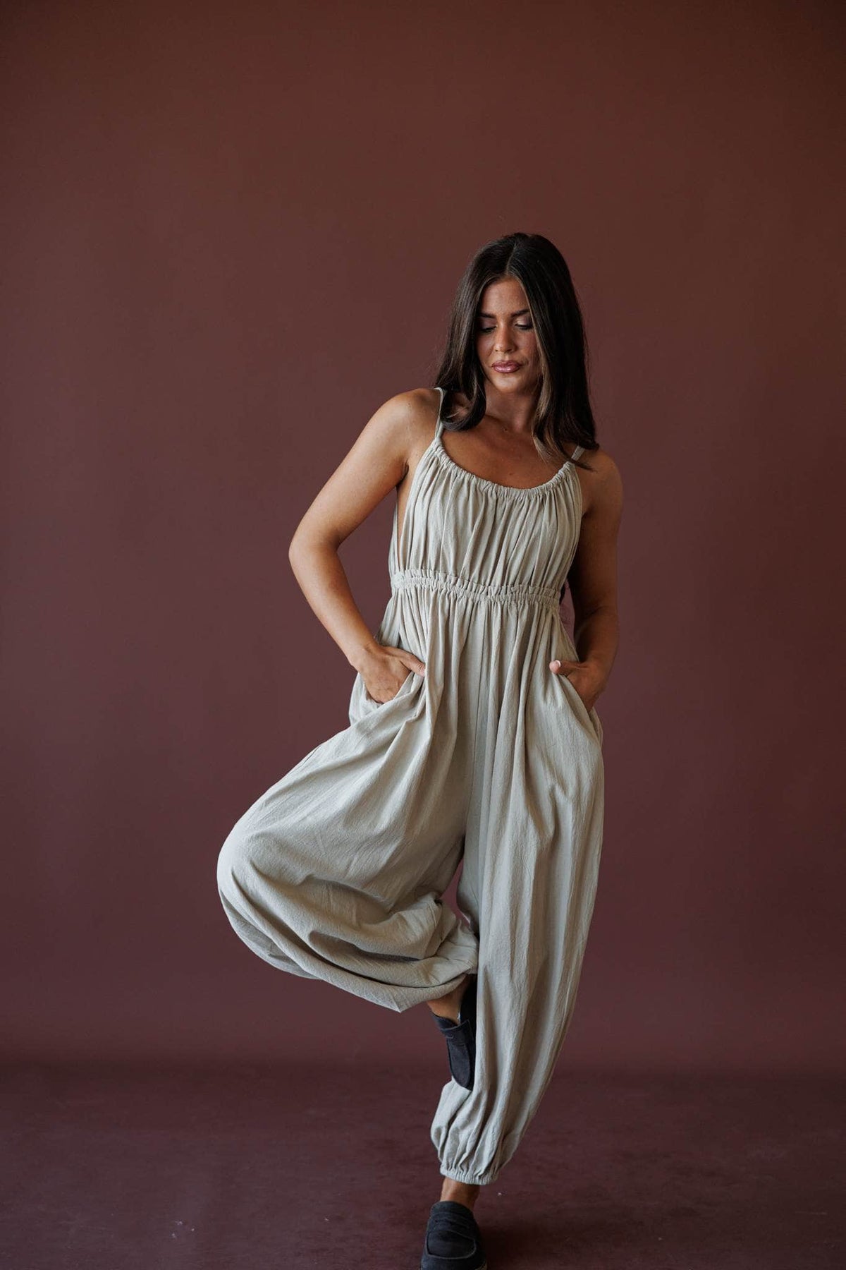 The Roam Jumpsuit, in sand, front view of the balloon leg