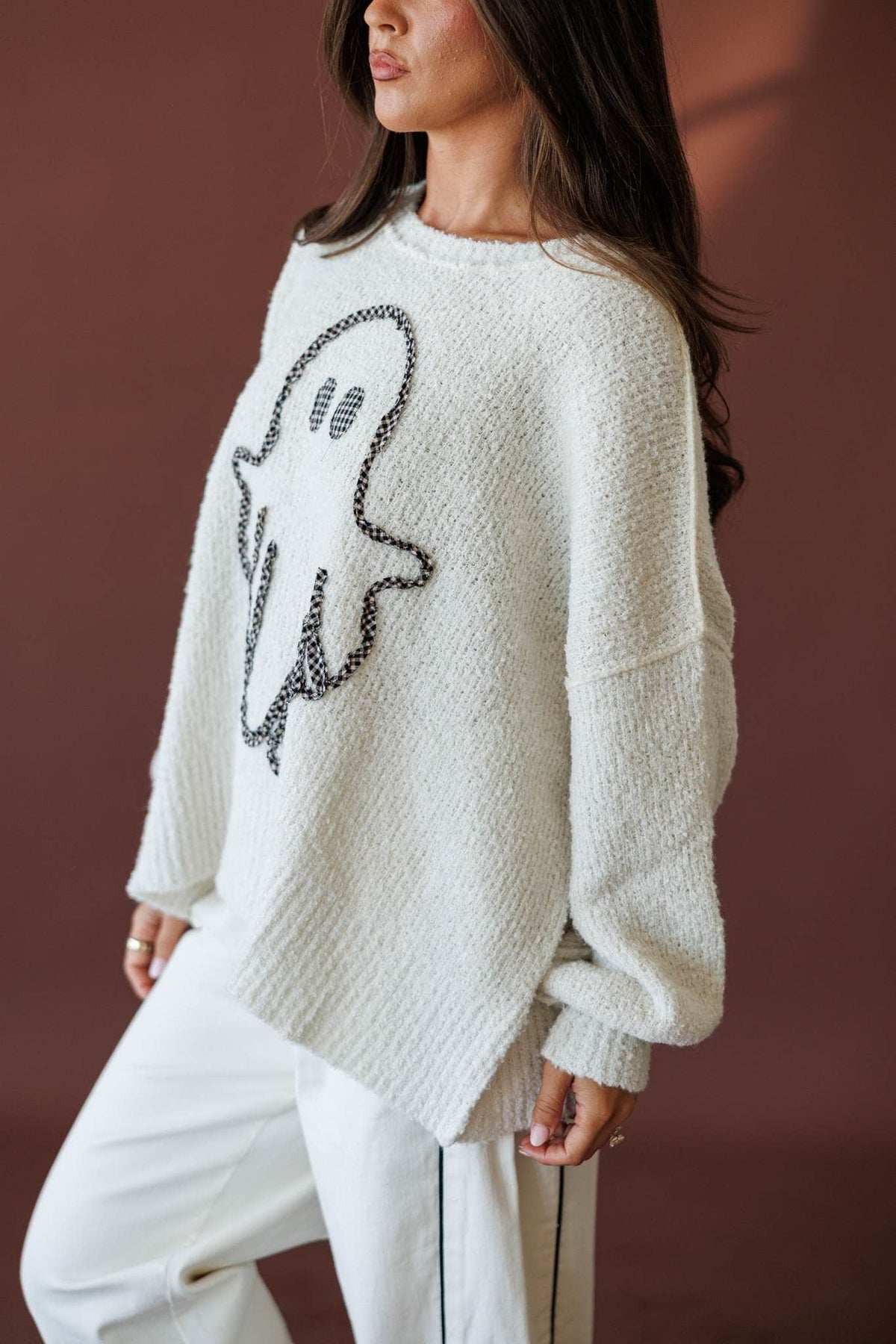 Friendly Ghost Sweater, side view of the split hem