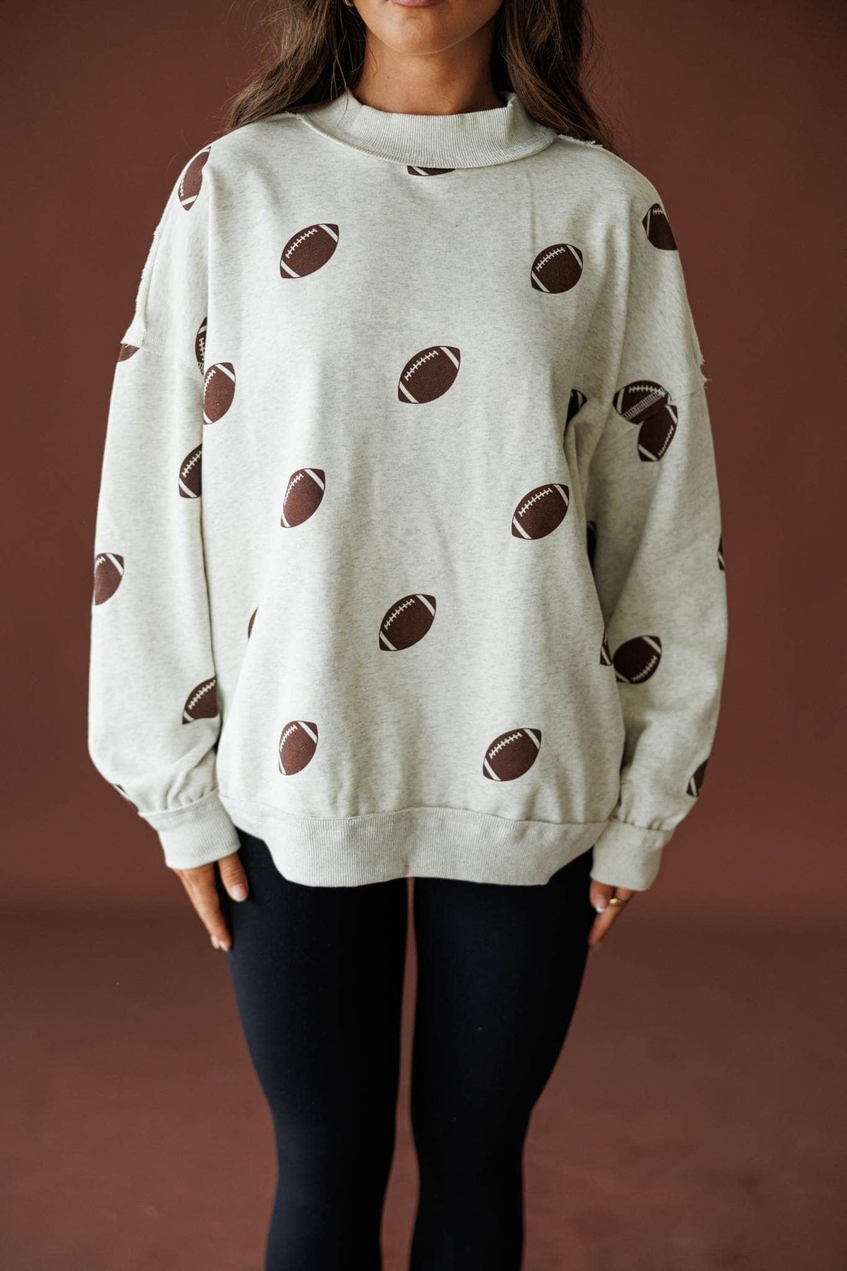 Double Down Reversible Sweatshirt in heather grey, front view of the all over football print side