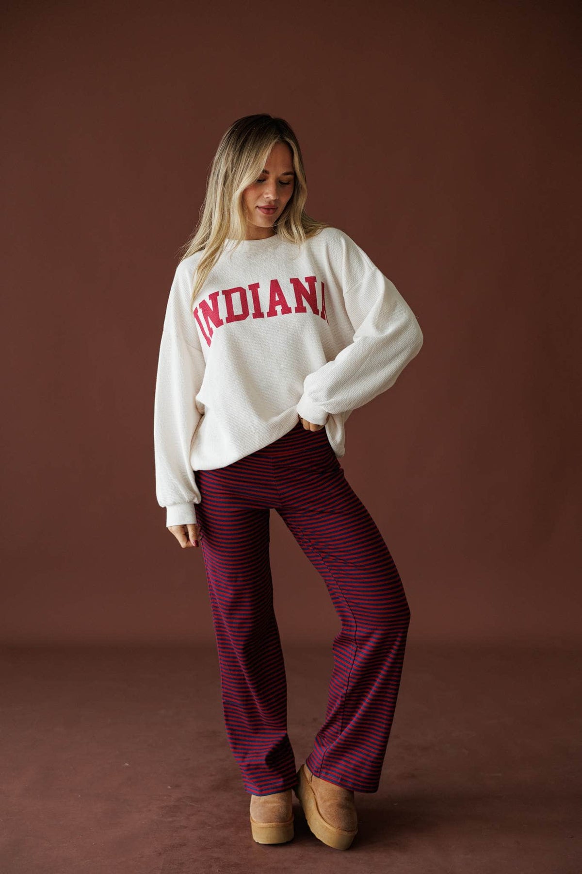 Indiana Cloud Knit Sweatshirt in ivory, full-length view with burgundy striped pants