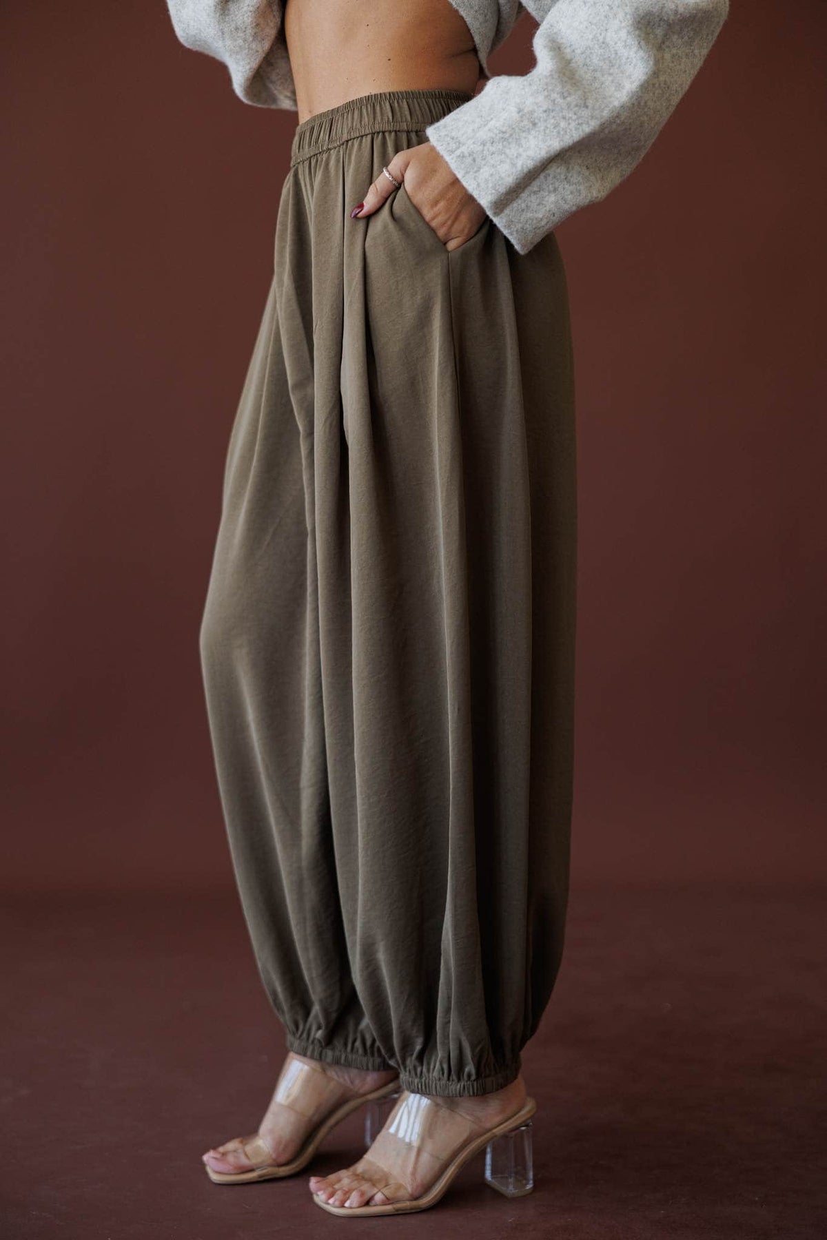 Olive Press Satin Pants, in khaki, close view of the elastic waistband