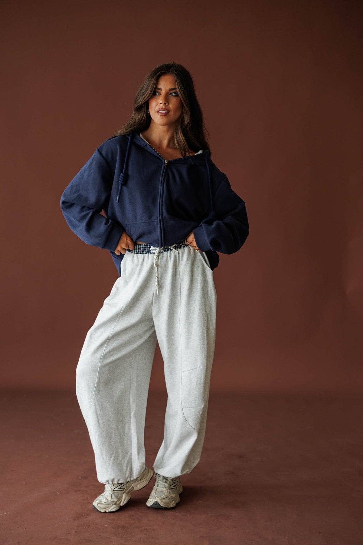 Slow Down Wide Leg Joggers in light heather grey, full-length view with a navy zip up jacket