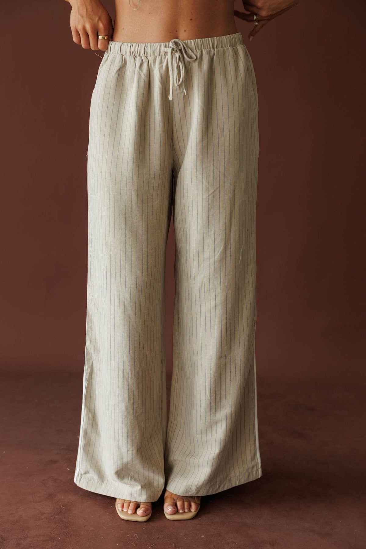 Cream and blue stripe wide leg pants, front view