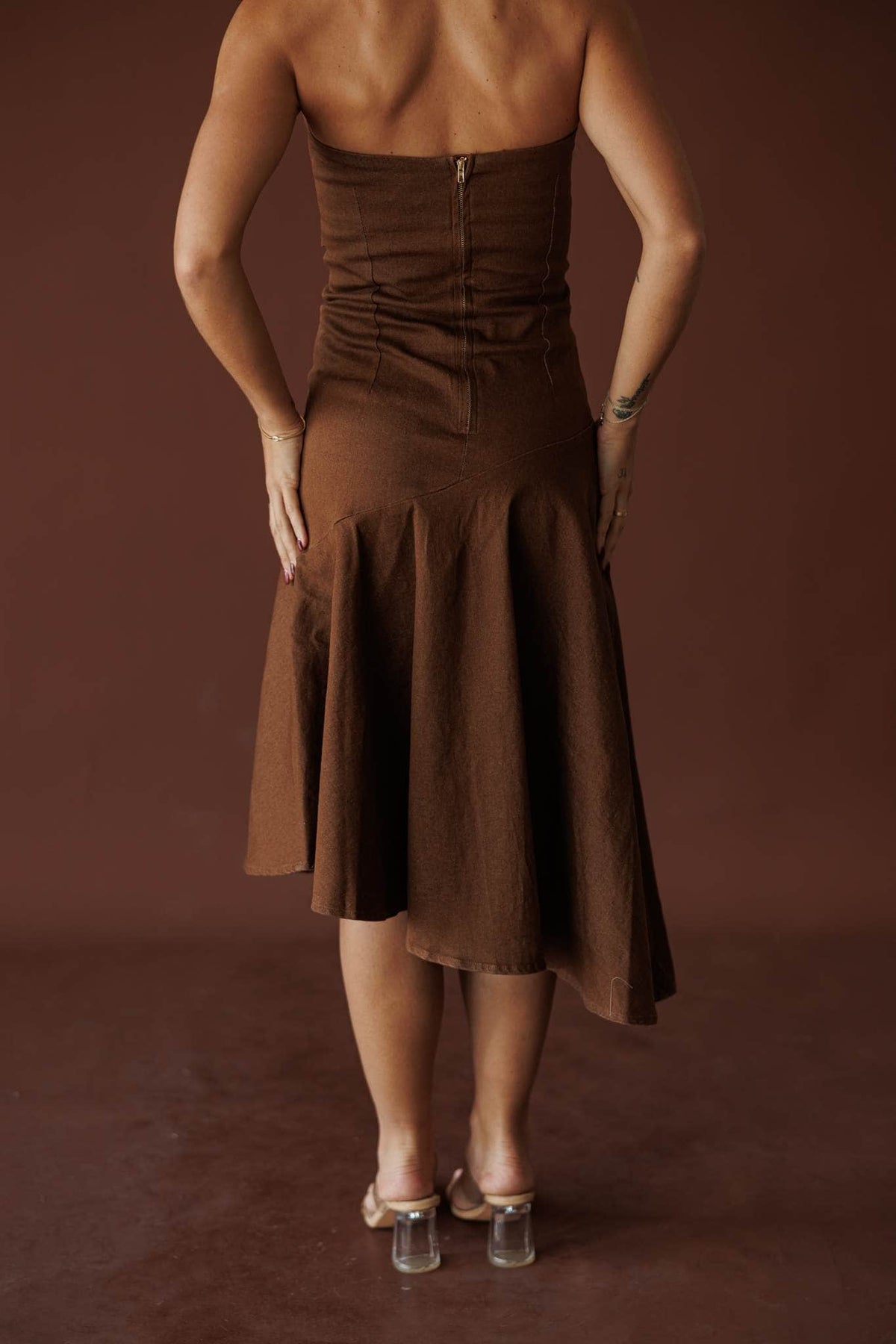 Brown denim strapless asymmetric midi dress