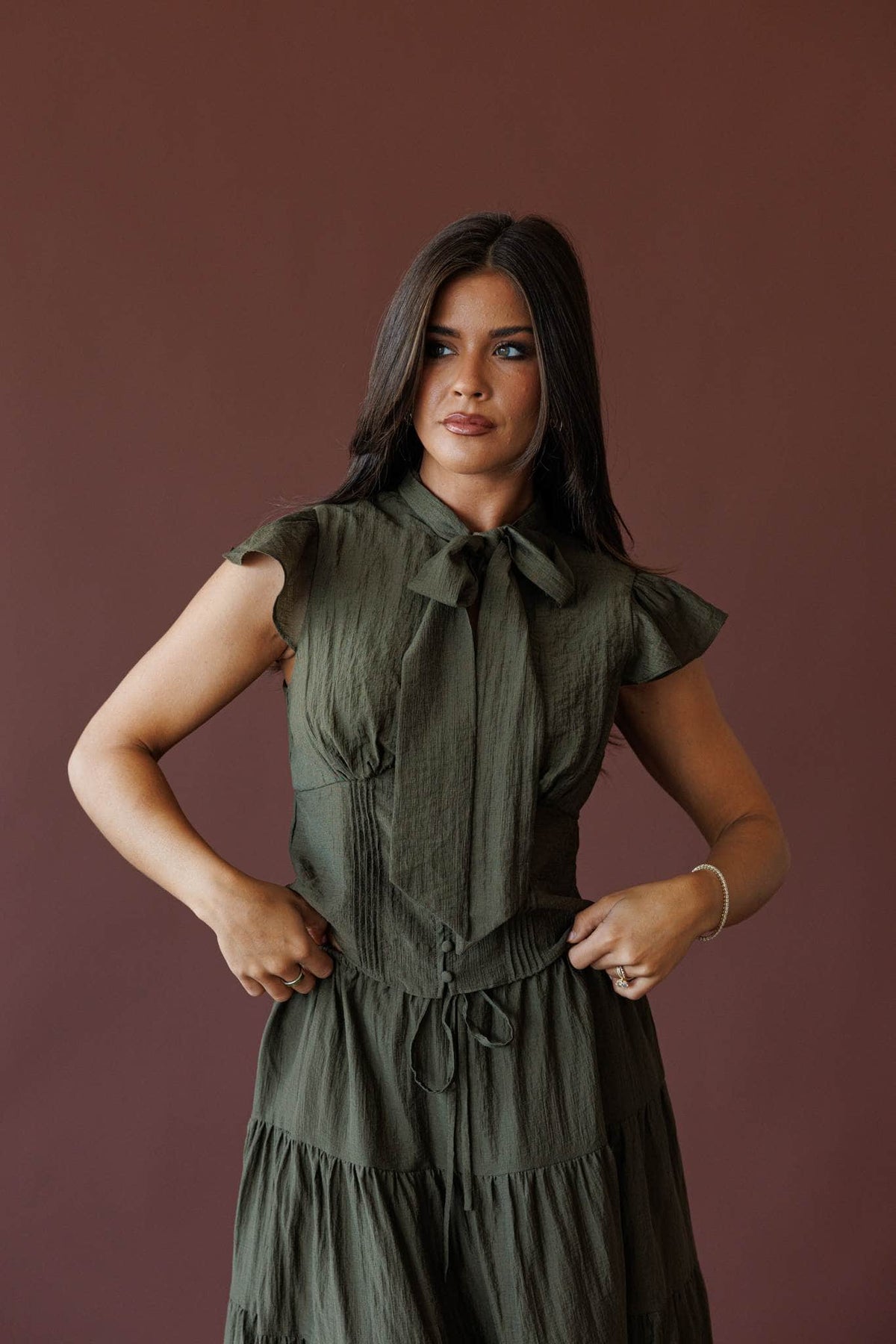 Olive flutter sleeve top, front view