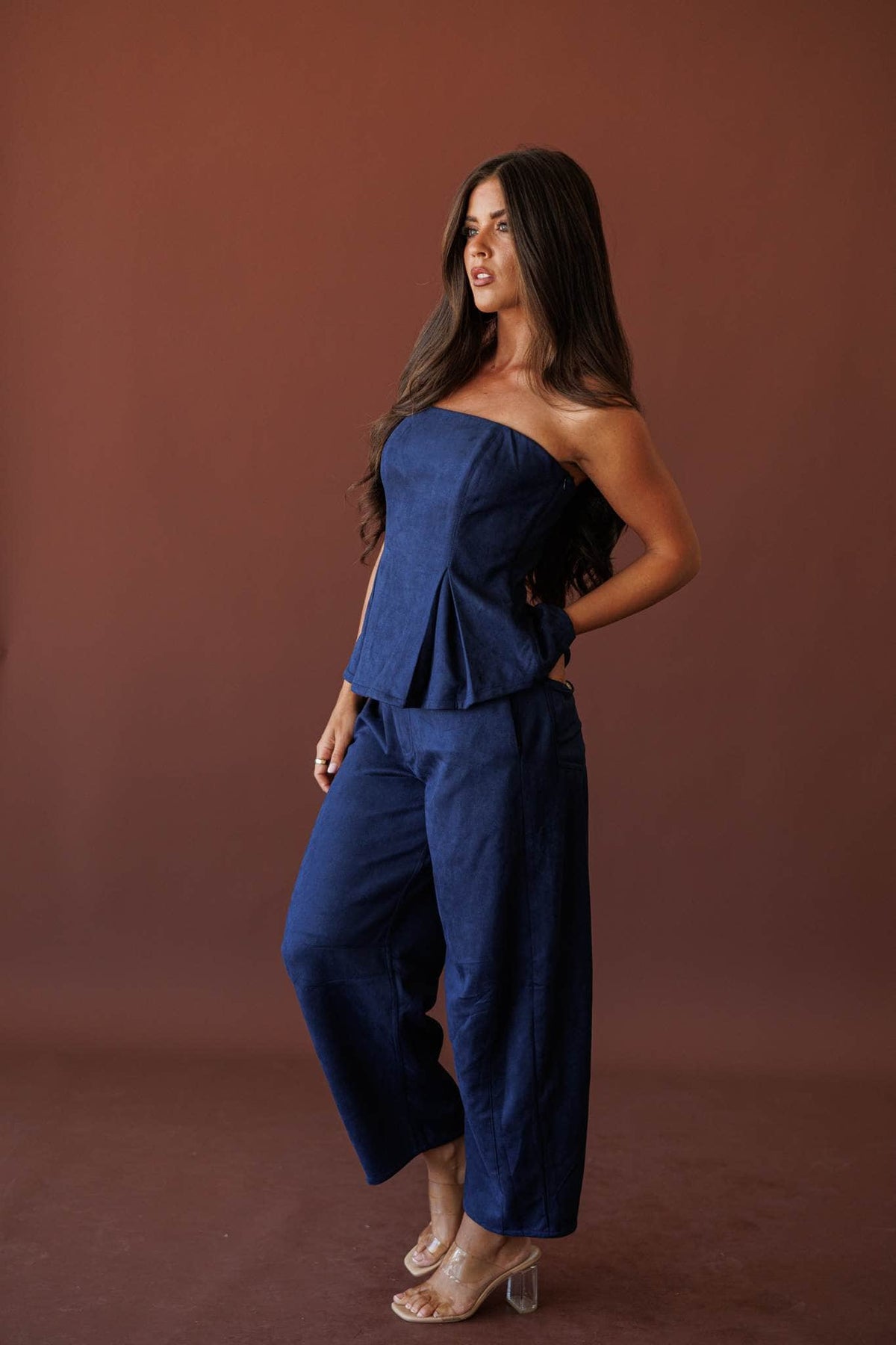 Suede Society Strapless Top, in navy, side view with the matching barrel pants
