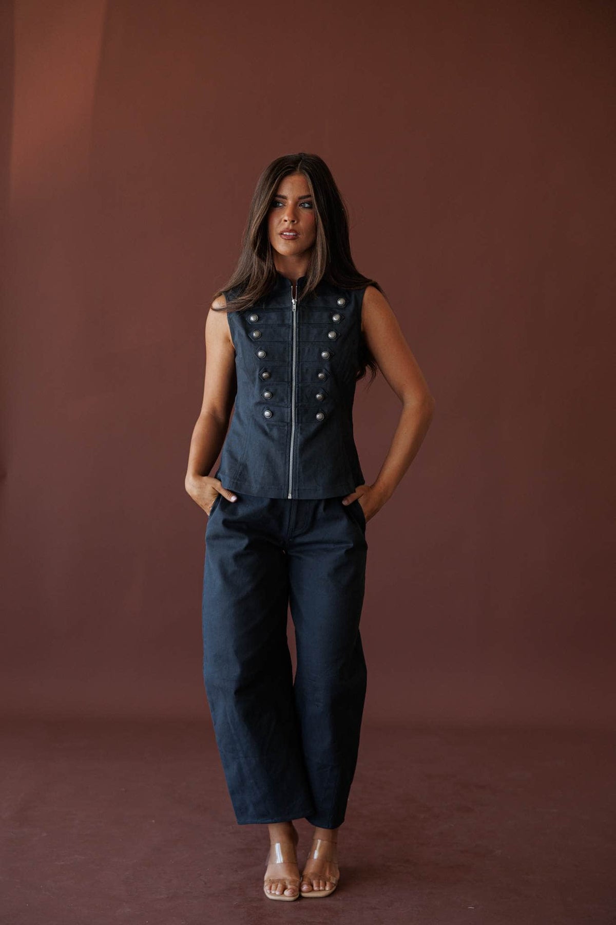 The Regent Barrel Pants, in navy, full-length front view with the military vest