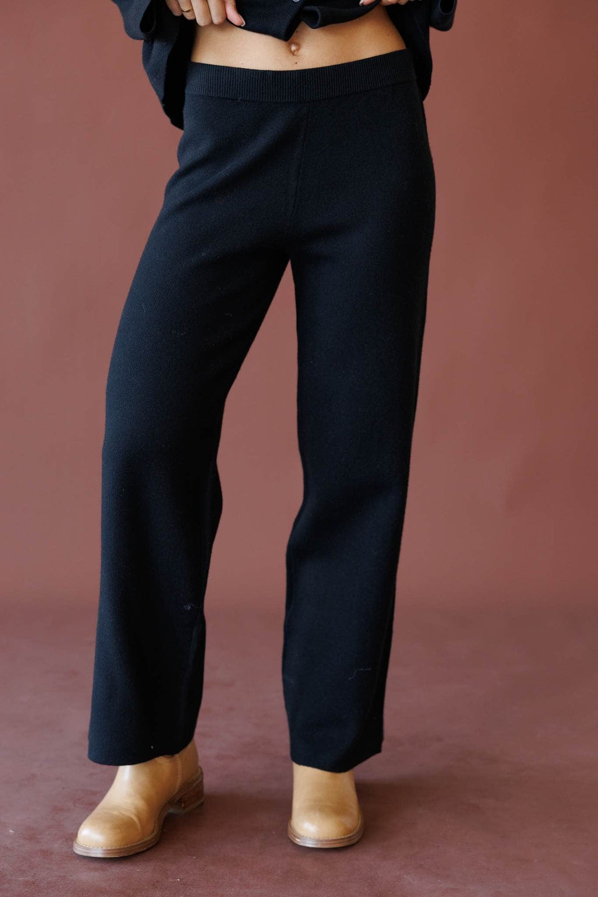 Black sweater pants, front view