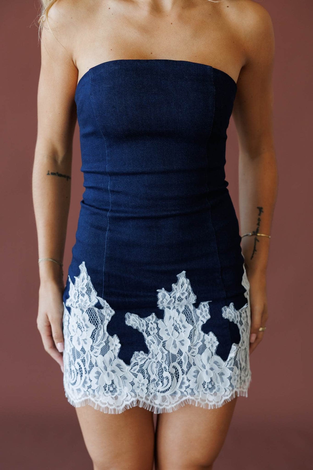 Dark denim mini dress with ivory lace trim
