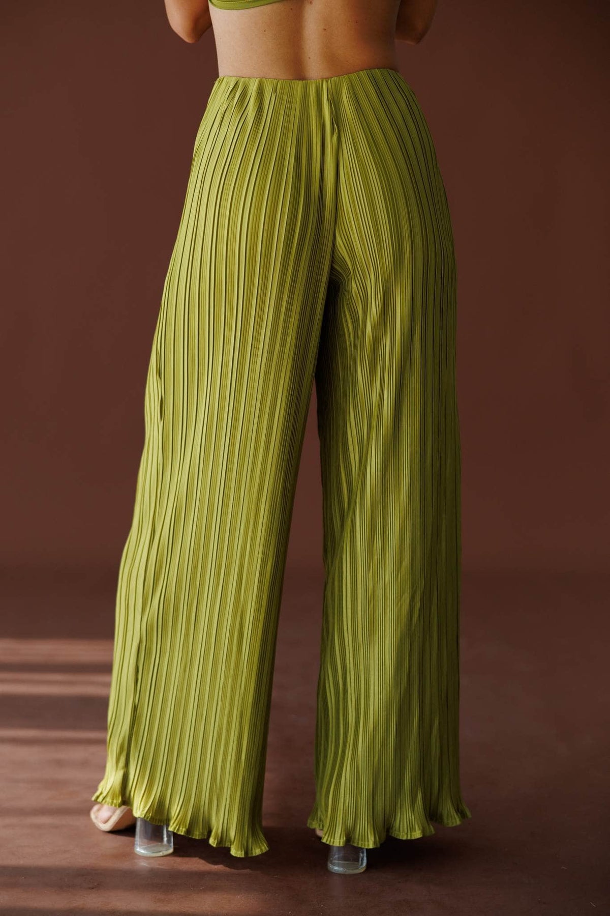 Muse Moments Pleated Pants in olive, back view showing the elastic waist and pleats