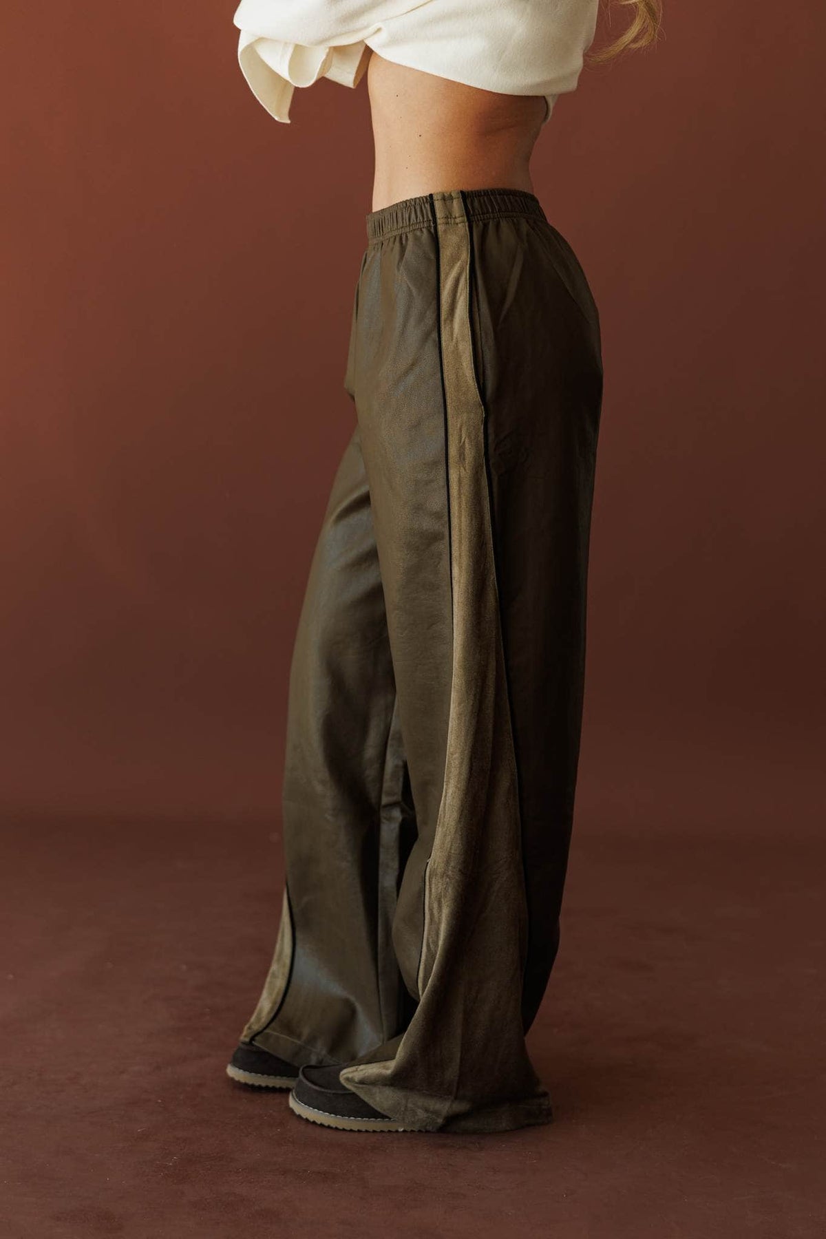 Expedition Suede Pants, in olive, front view of the elastic waist