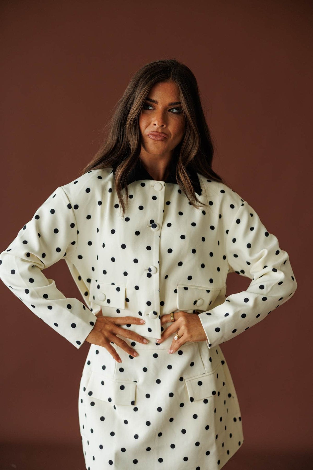 Private Party Jacket in cream black dot, front view of the contrast collar and button front