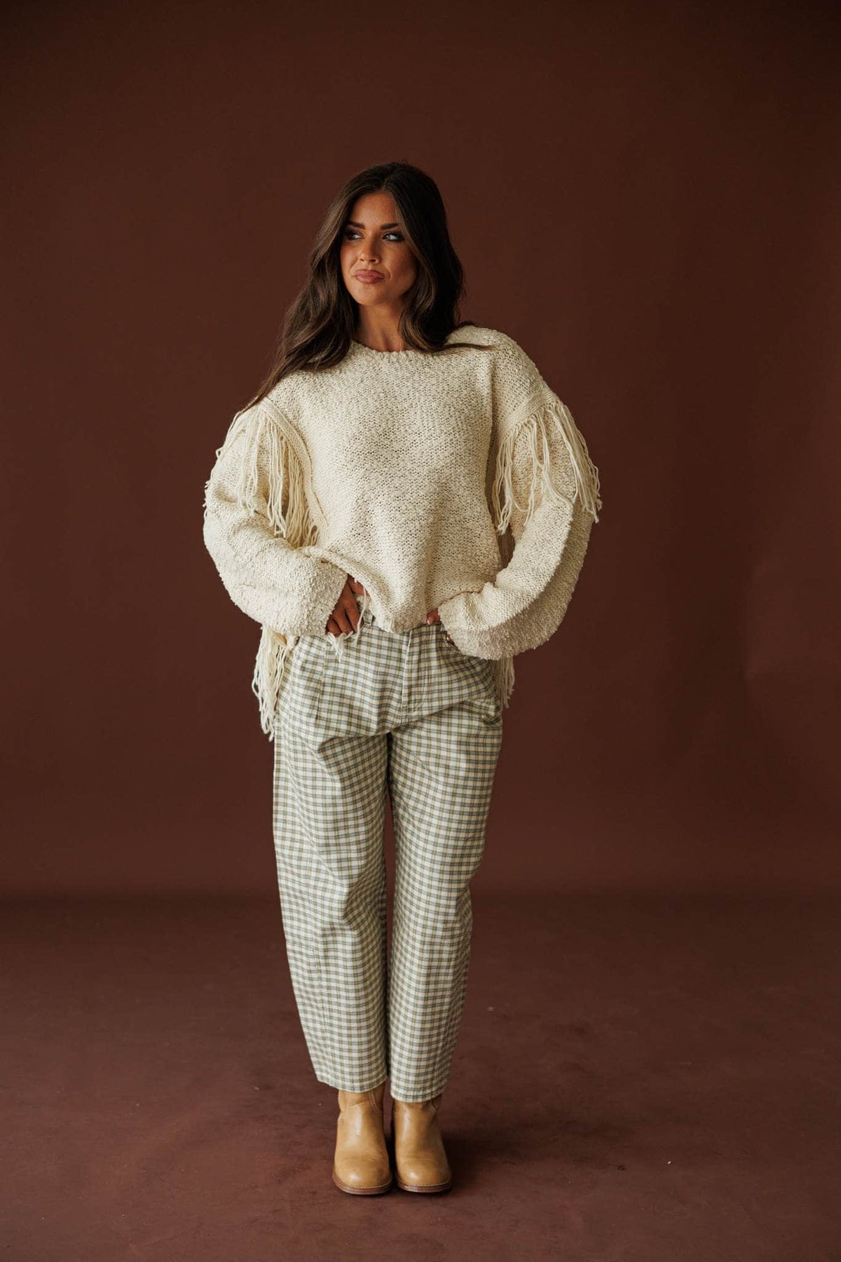 Picnic Plans Gingham Trousers, in olive mist, full-length front view with a cream sweater