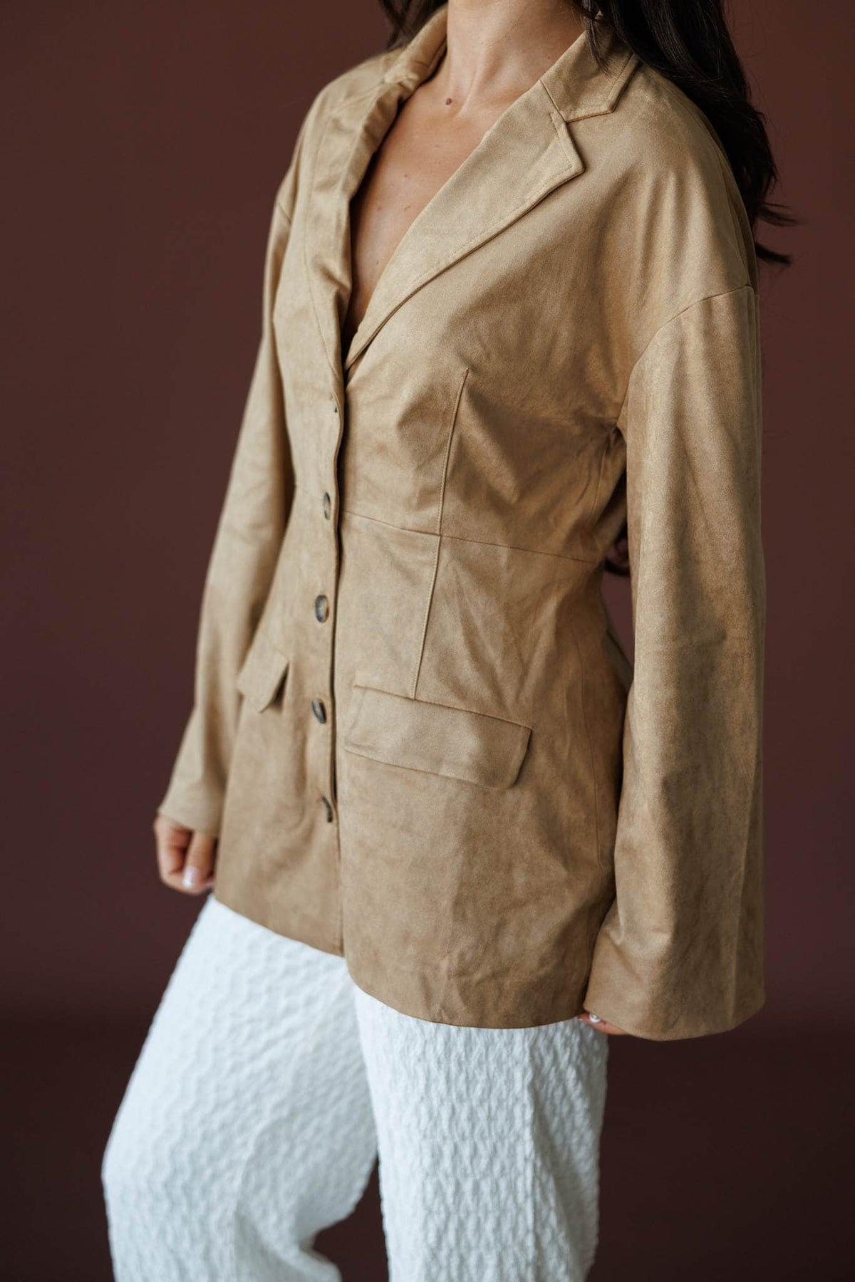 Paddock Suede Blazer in light brown, front view showing the welt pockets and suede