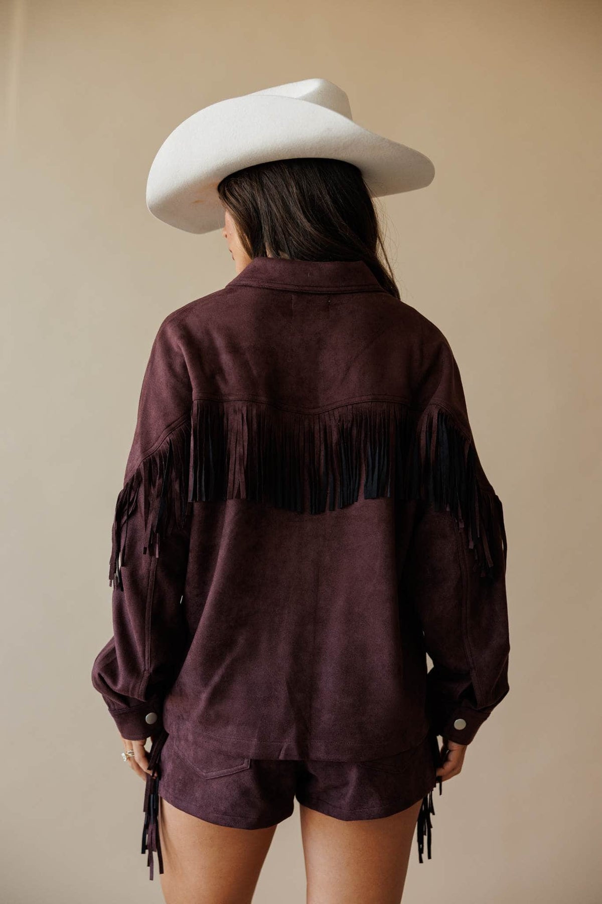 Dark brown suede jacket with fringe