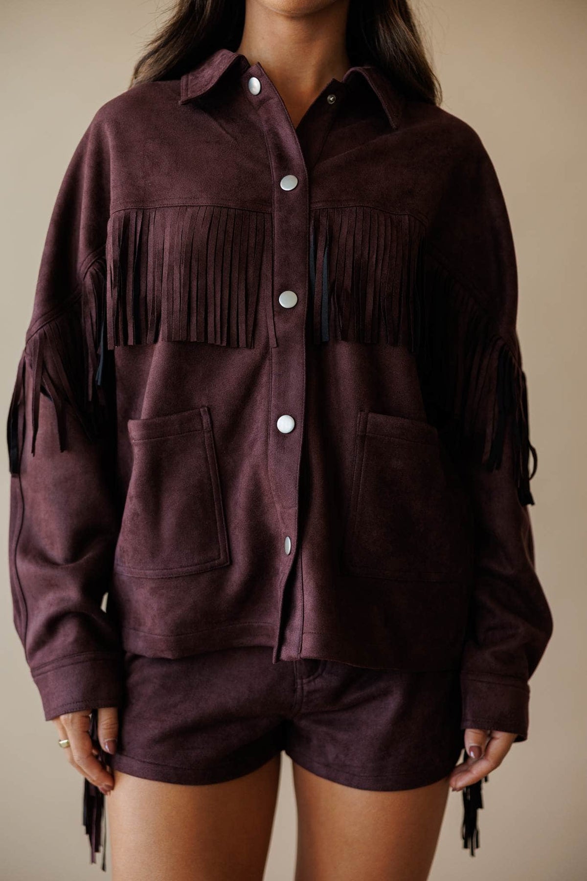 Dark brown suede jacket with fringe