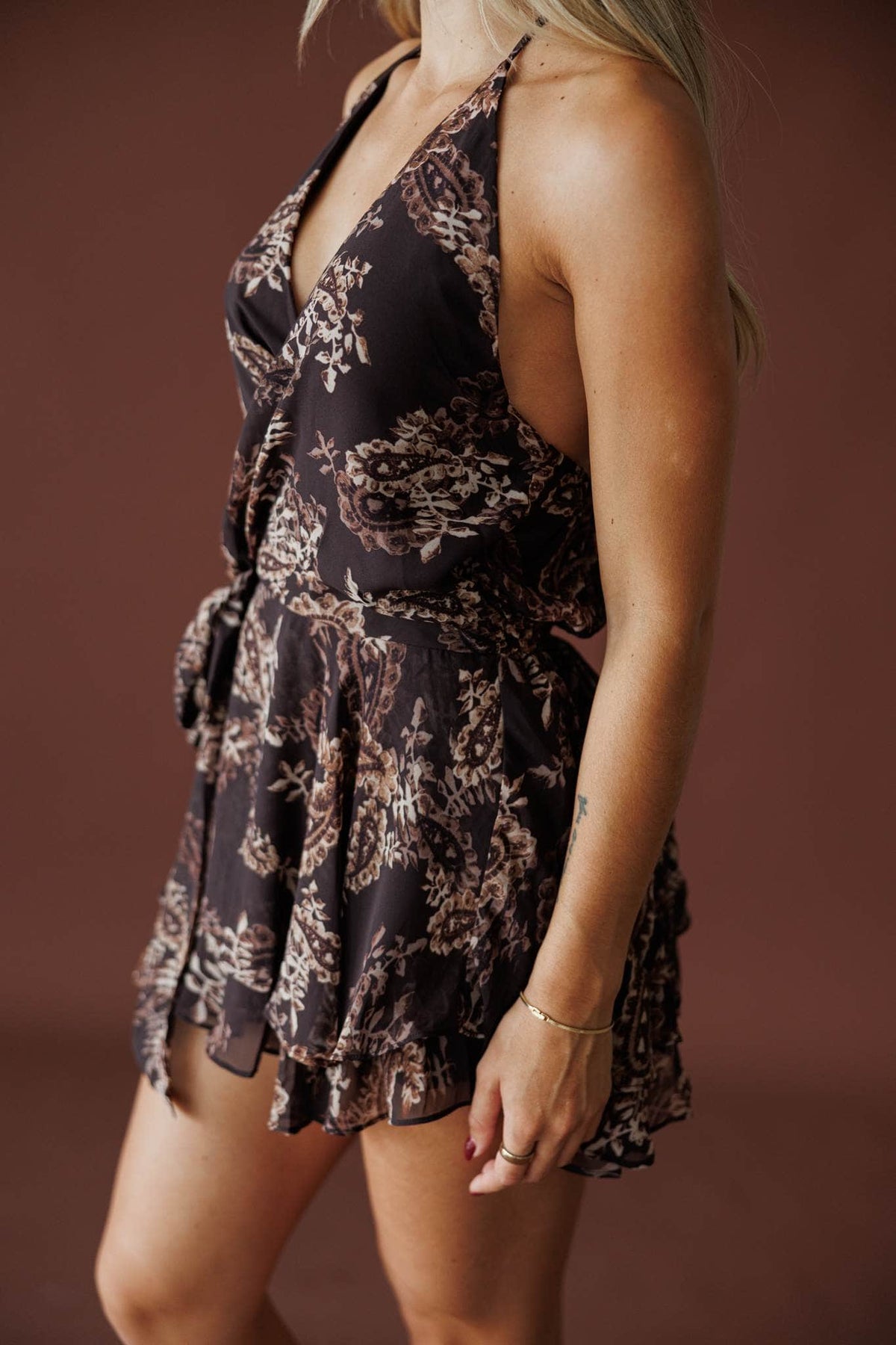 Paisley Nights Halter Dress in brown paisley, side close-up of the ruffle tiers and halter