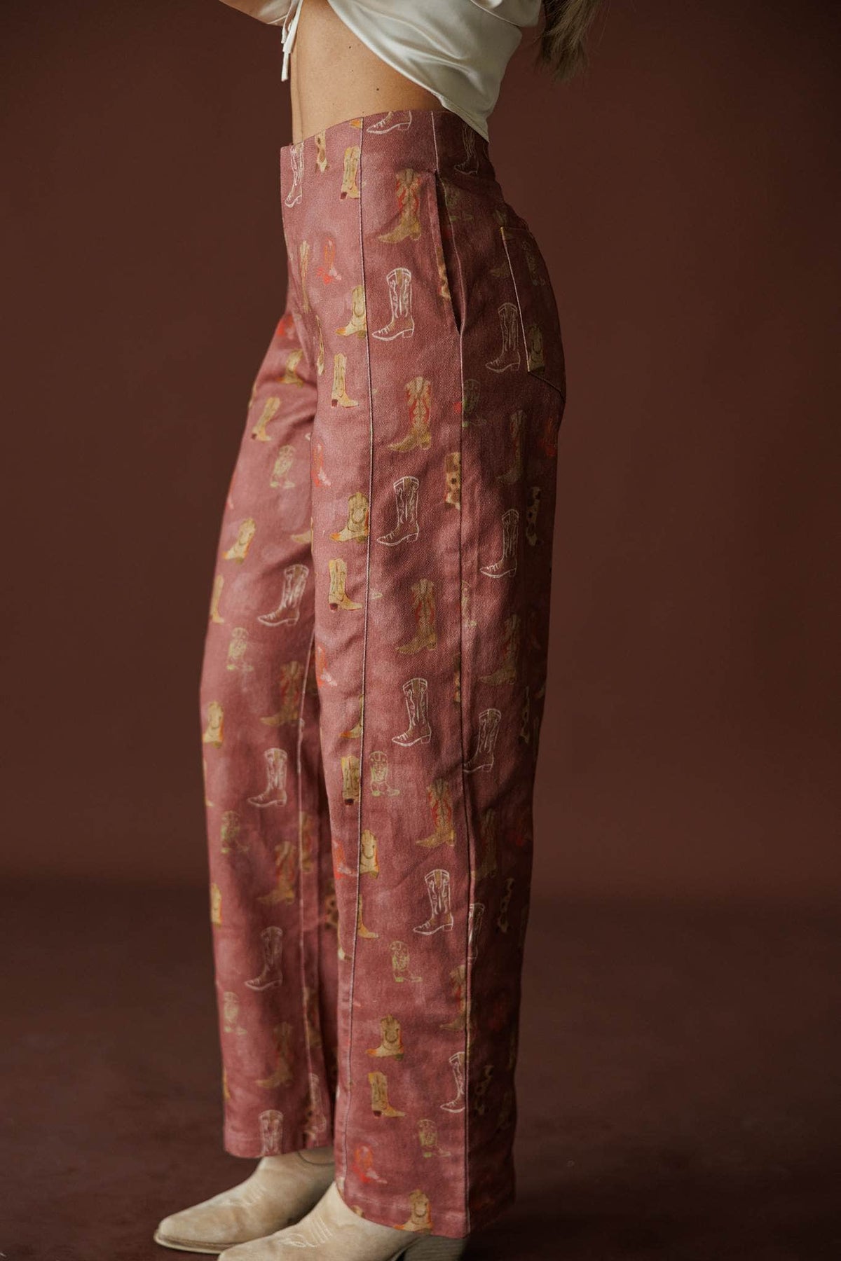 Rodeo Road Printed Pants in brick red, side view showing the straight leg printed pants