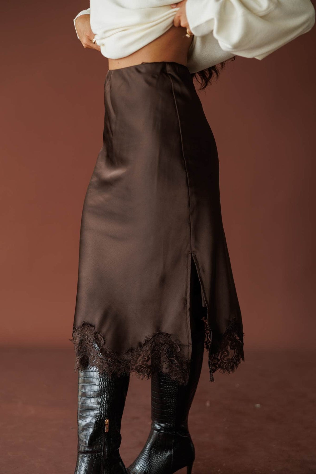 Satin Secrets Lace Midi Skirt, in dark chocolate, close side view of the slit hem
