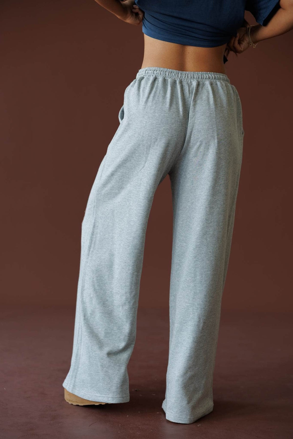 Sideline Wide Leg Pants in heather grey, back view showing the elastic waist