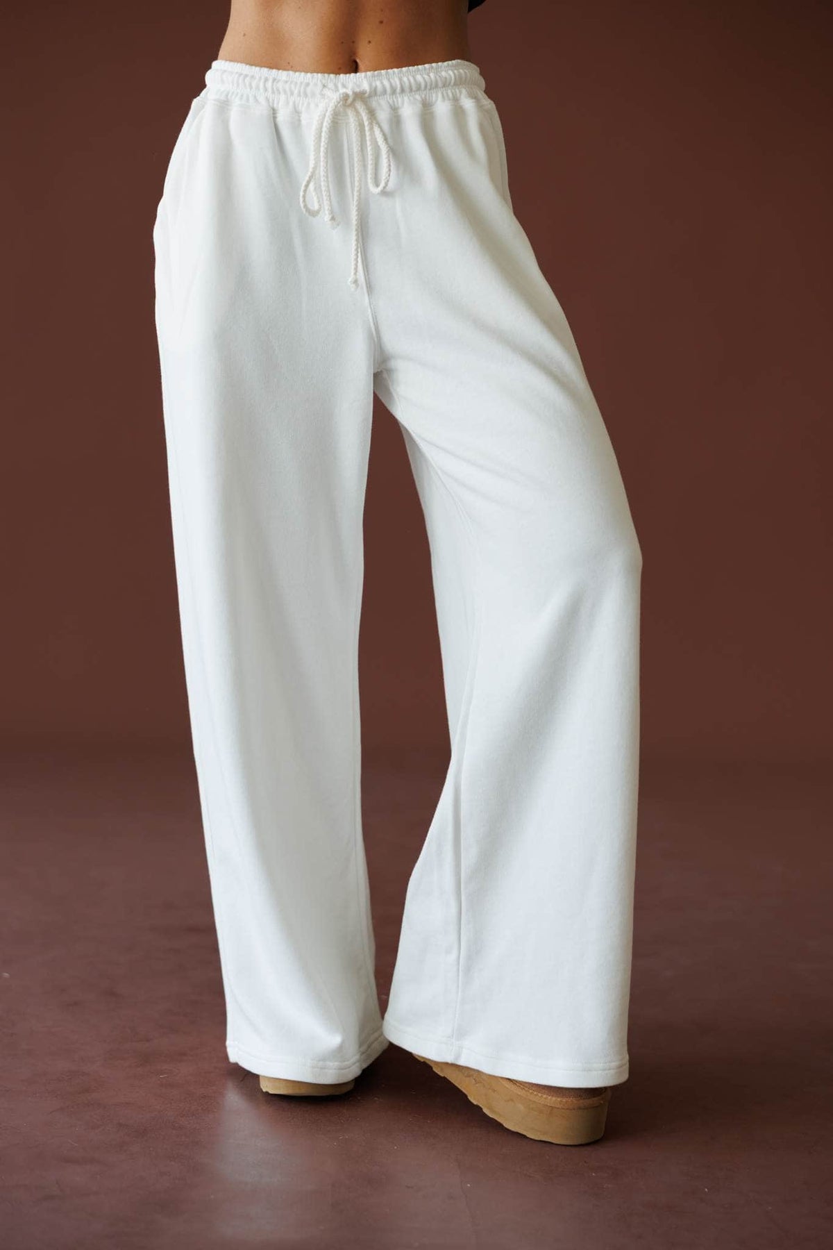 Sideline Wide Leg Pants in off white, front close-up of the drawstring waist and wide leg