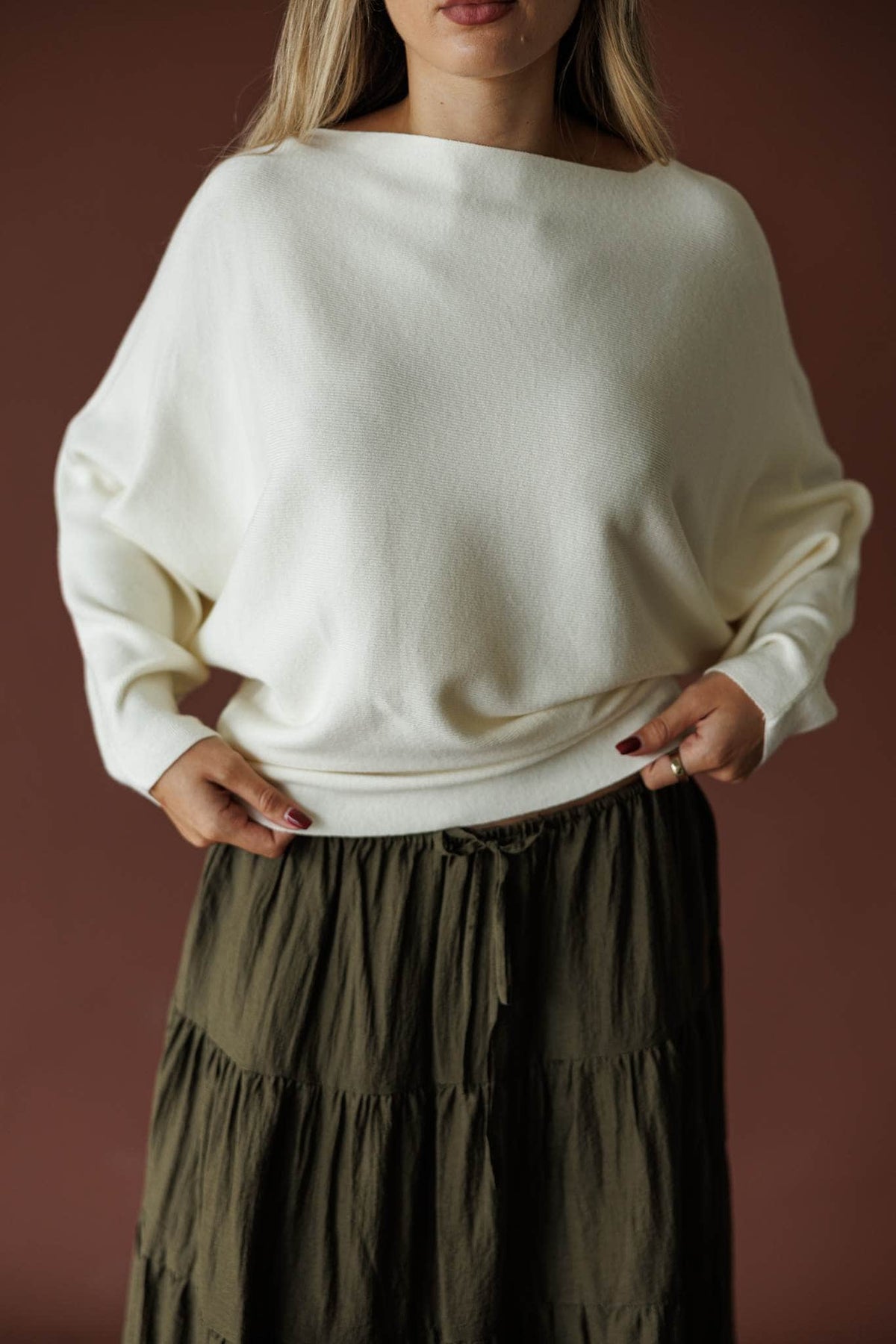Cream boat neck knit top with blouson sleeves