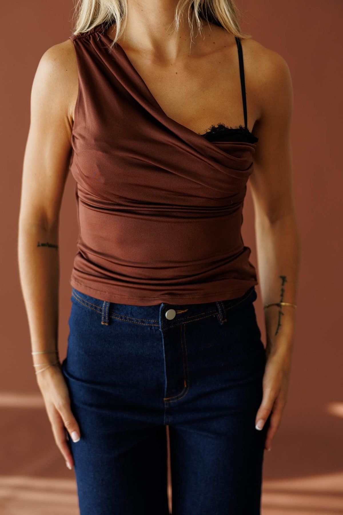 Street Stories Top in brown, front close-up of the draped one shoulder neckline