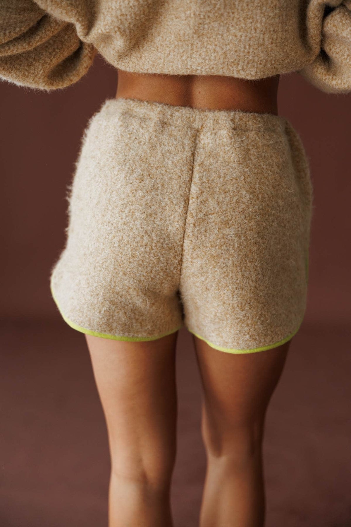 Sundance Sherpa Shorts in butter, back view showing the contrast trim sherpa shorts