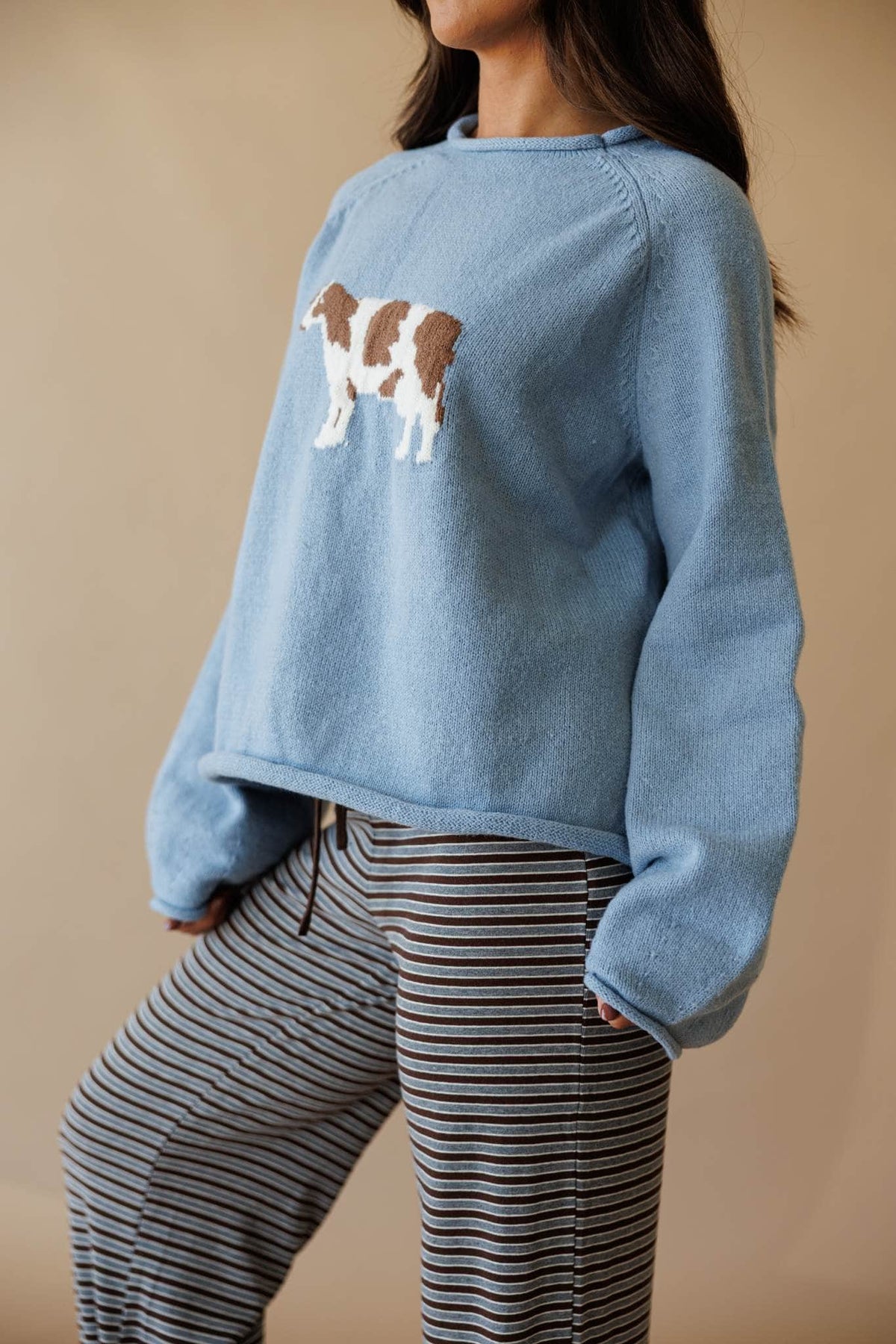 Dusty blue sweatshirt with cow graphic