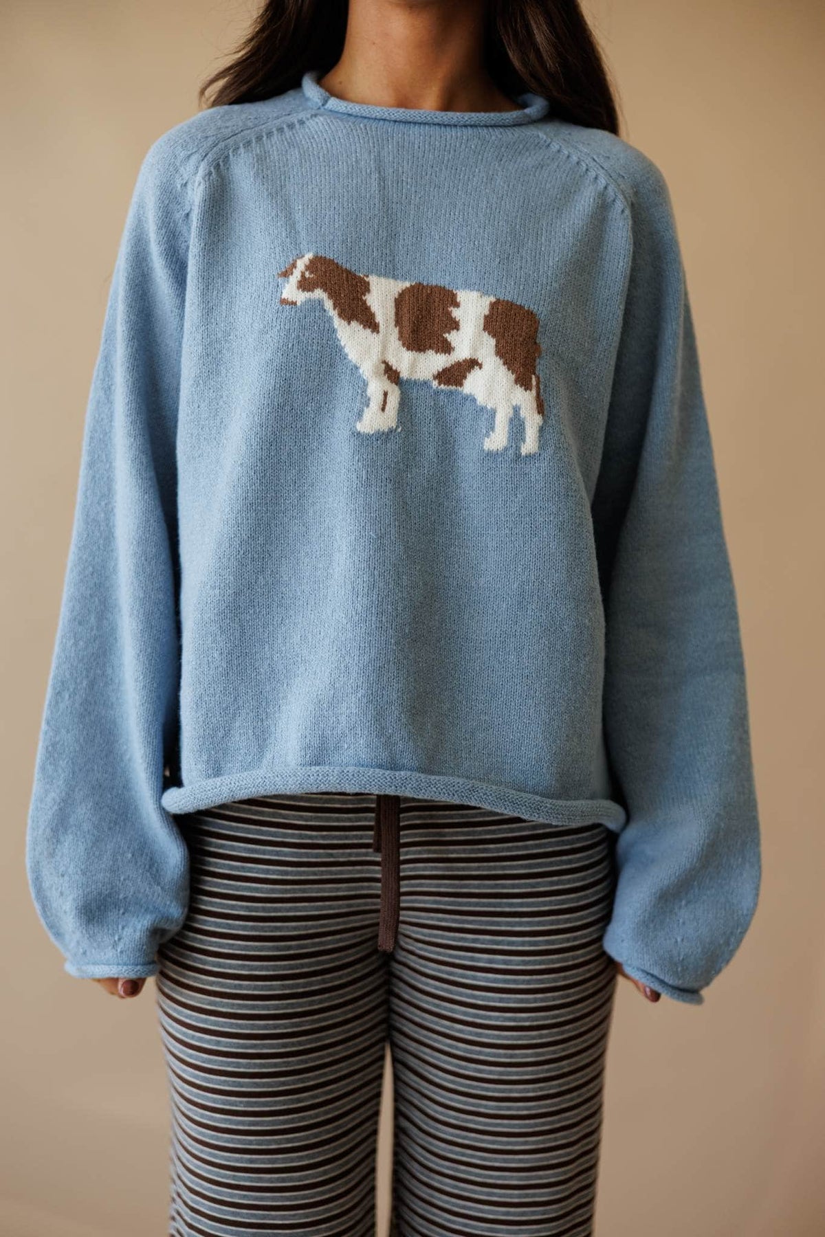Dusty blue sweatshirt with cow graphic