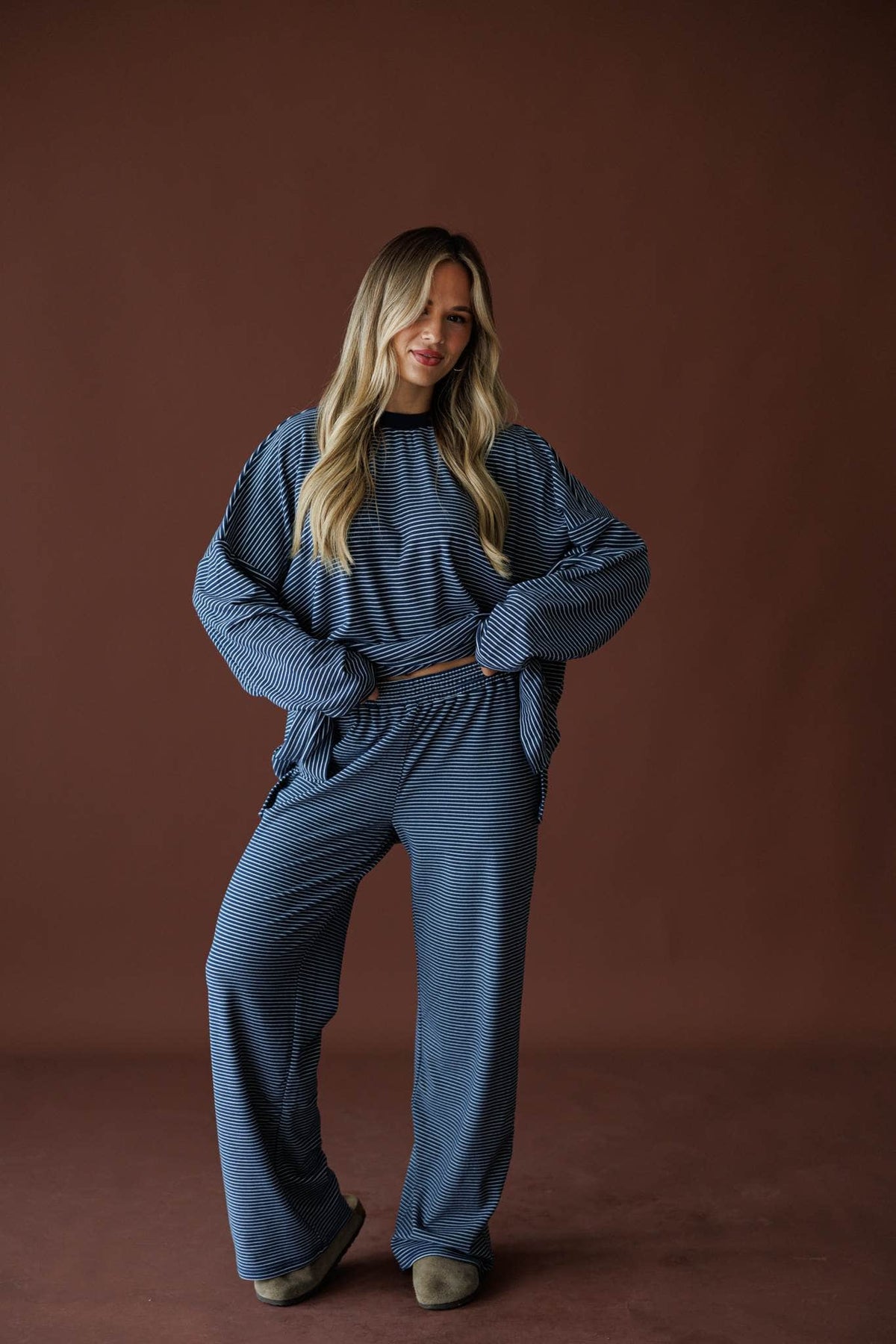 The Social Club Fleece Pants in navy, full-length view with the matching fleece top