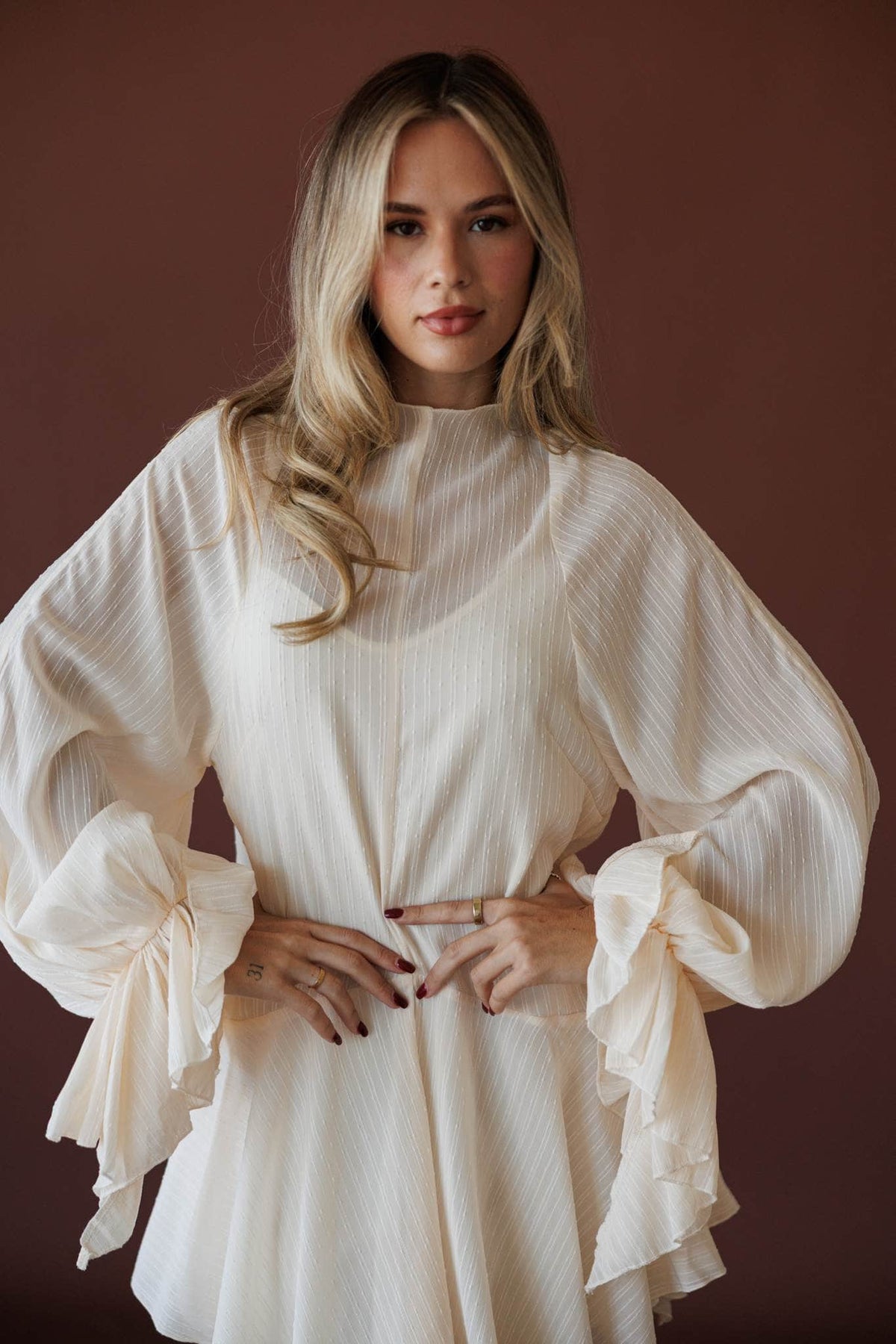 Cloud Nine Mini Dress, front view of the mock neck