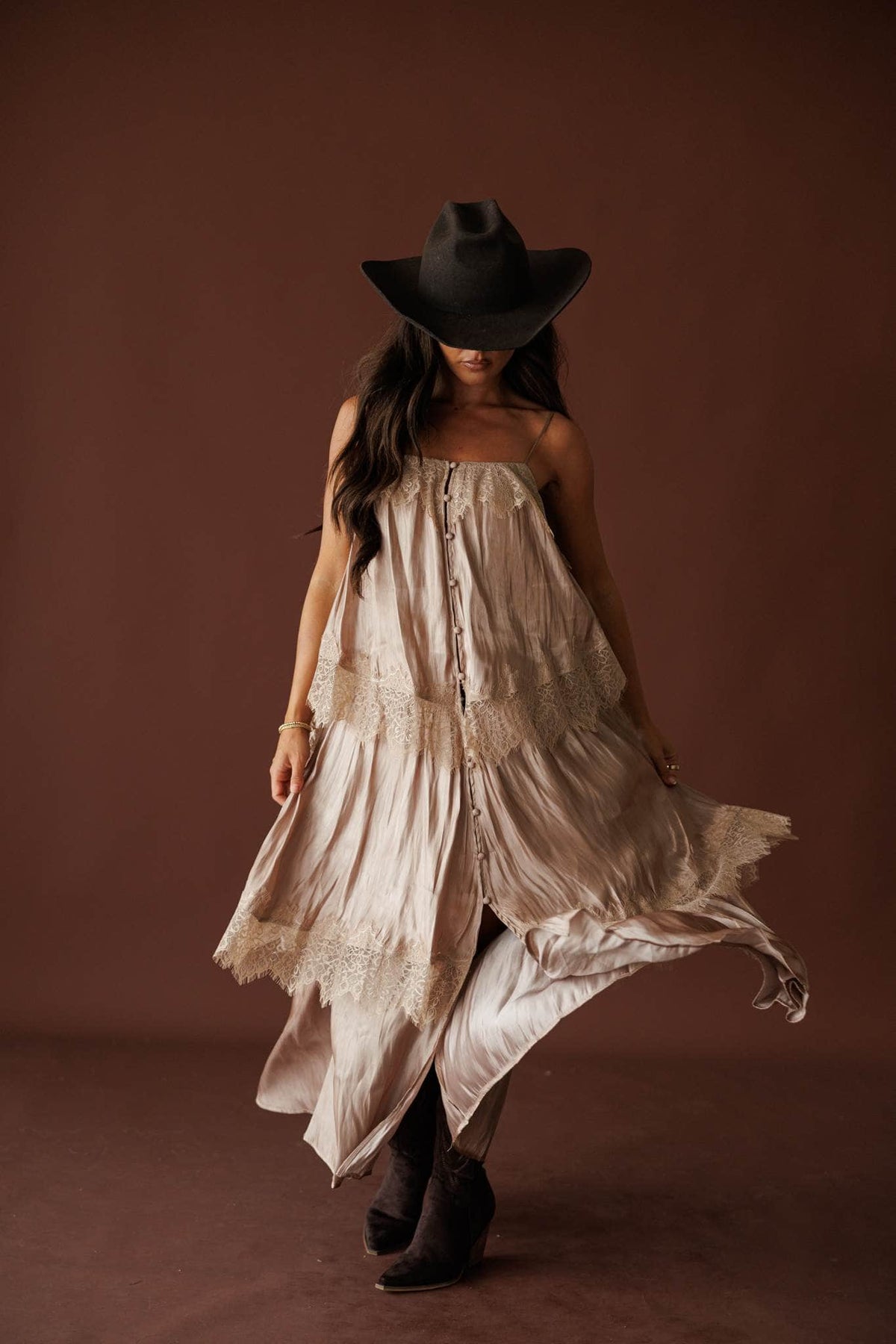Where The Wildflowers Grow Maxi Dress in sand, three-quarter back view walking